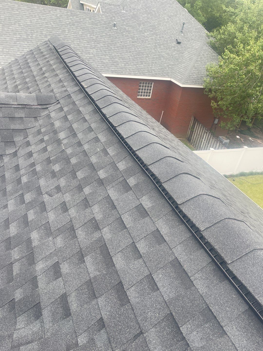 Residential Roofing Installation using Roof Replacement by American Roofing & Construction LLC