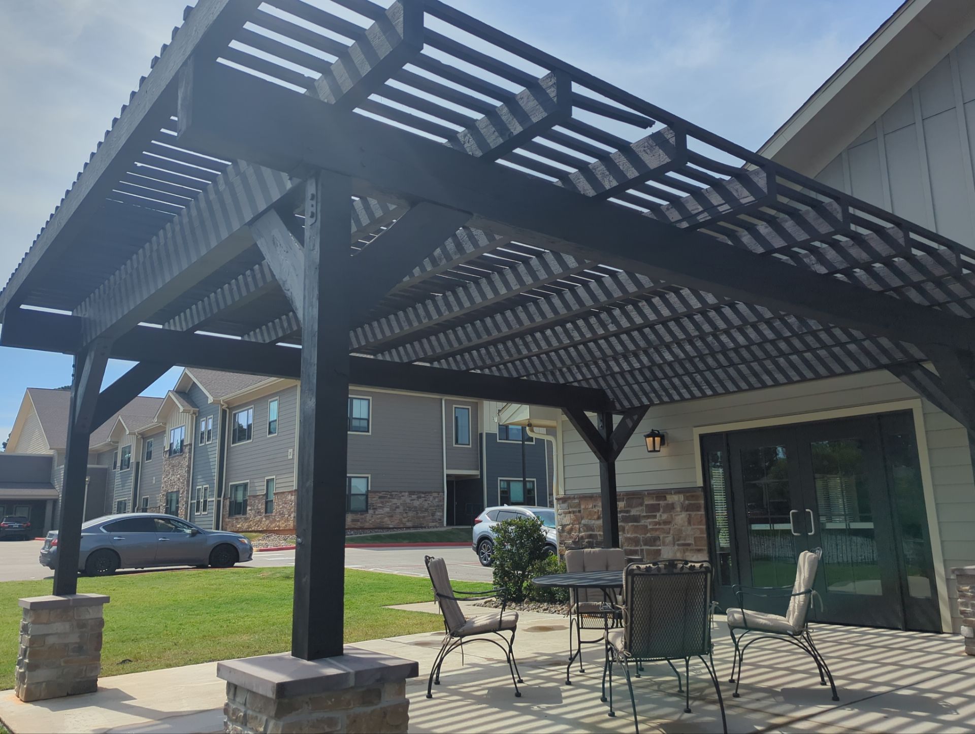 Exterior Painting in Tyler, TX | Front Porch in Elegant Black by Quality Coats Painting