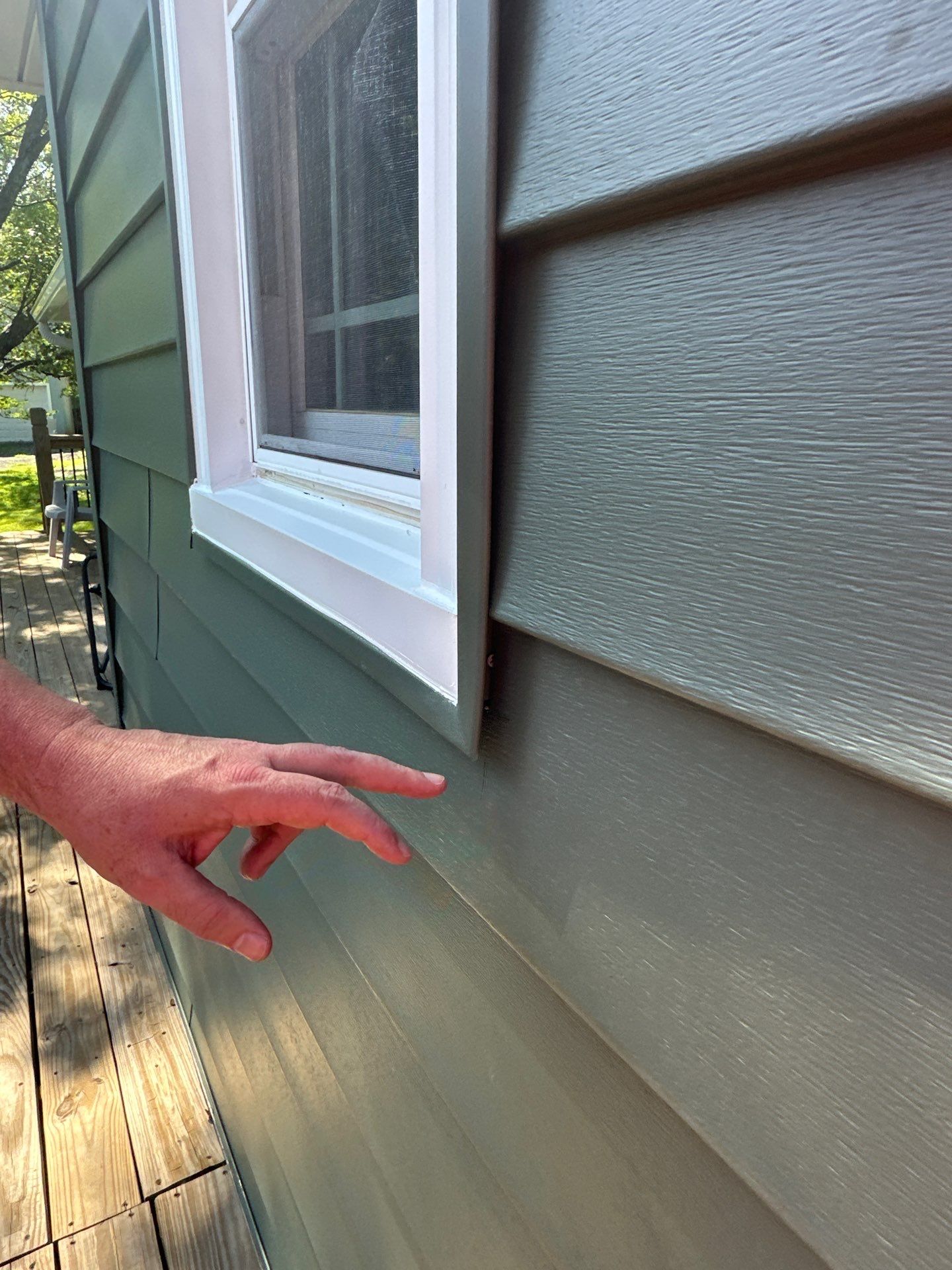 New Craneboard Siding on this Platte City, Mo home  by EEC  Windows, Siding & Roofing 