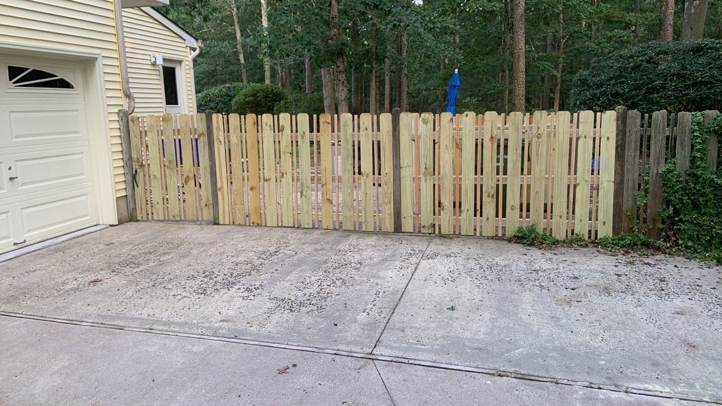 Custom Fence Built using Treated Lumber by A1 NERDY HOMES LLC