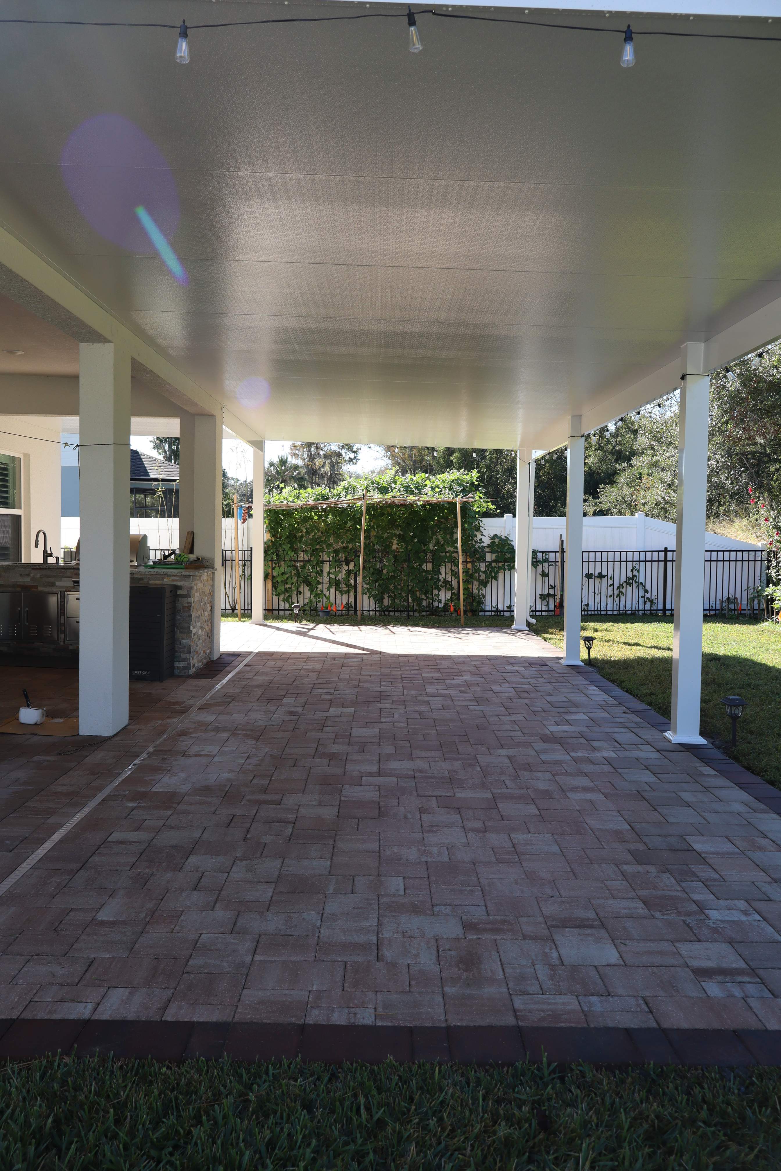 Patio cover with kitchen by Orlando pergolas 