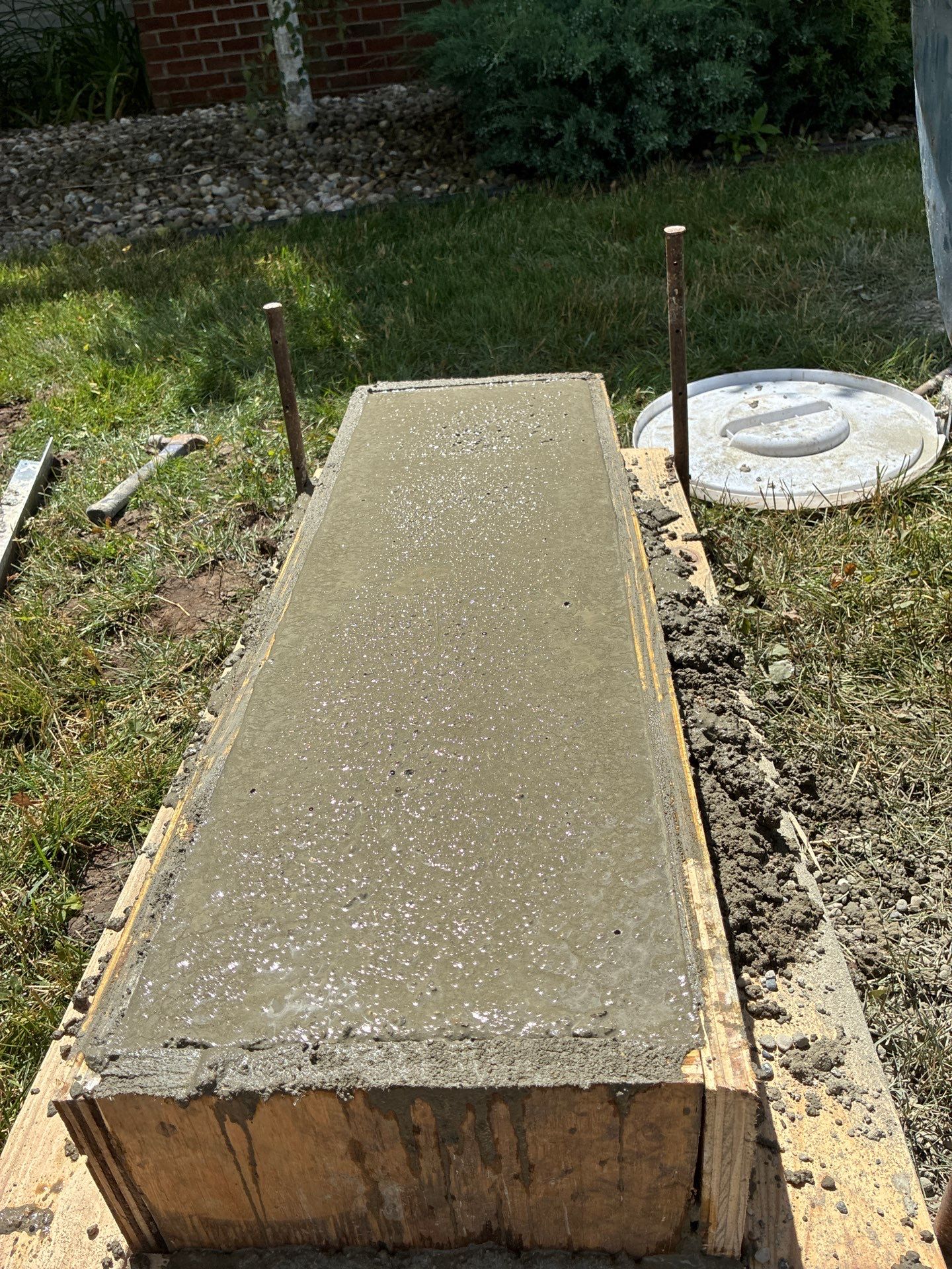Custom Monument Signage and Concrete Foundation Installation in Granger by Hayes Design co