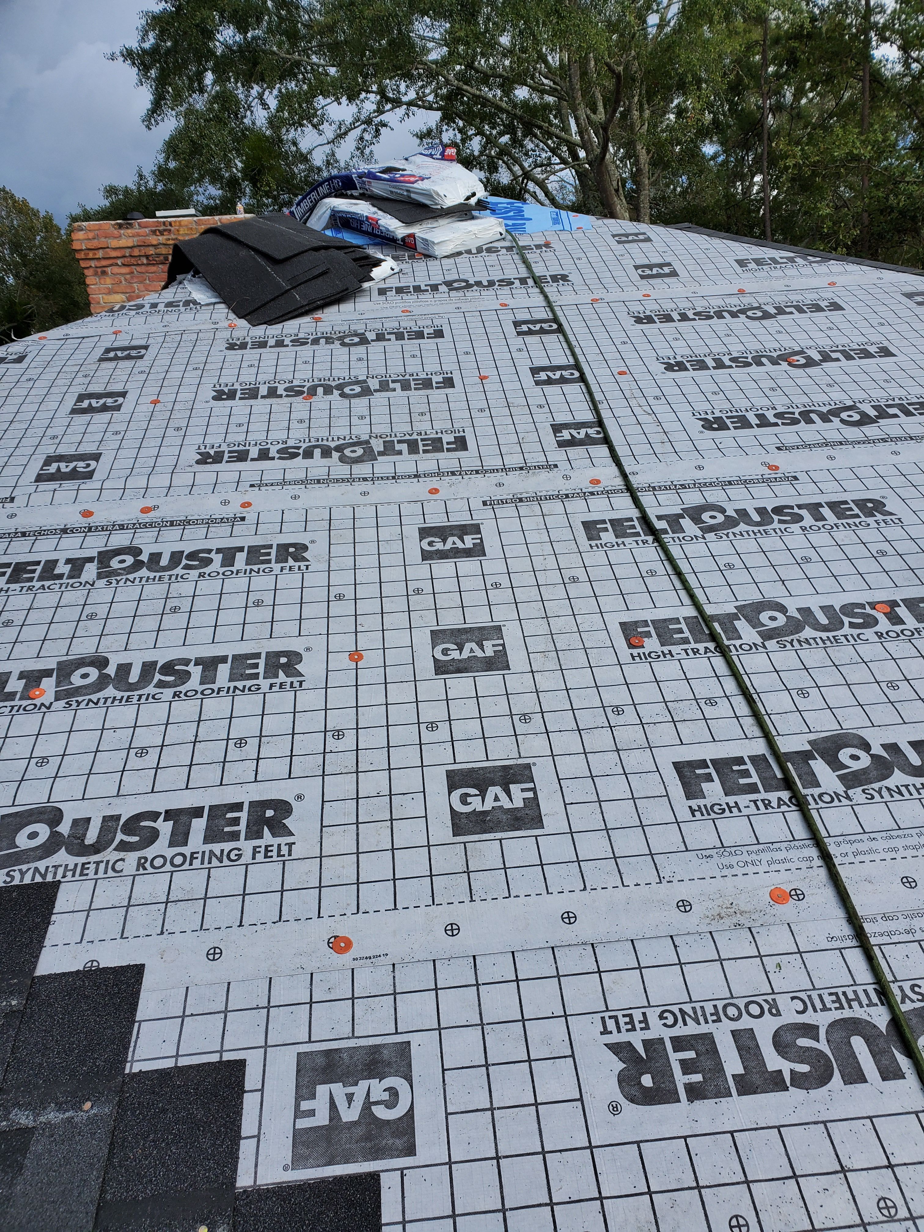 Residential Roofing Installation using Roof Replacement by American Roofing & Construction LLC