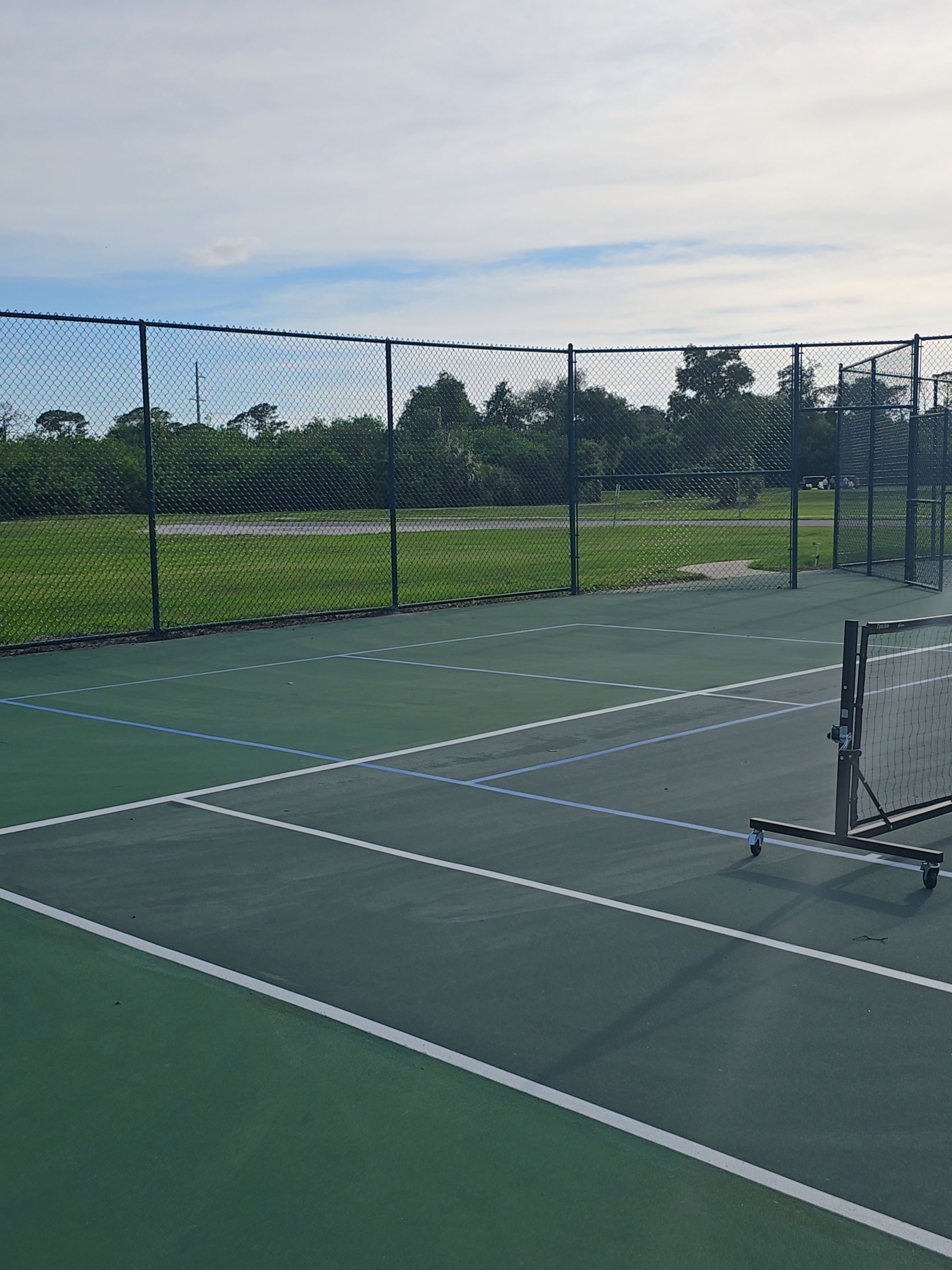 Commercial Tennis Court Chain Link Fence Repair in Sarasota by True Fence LLC