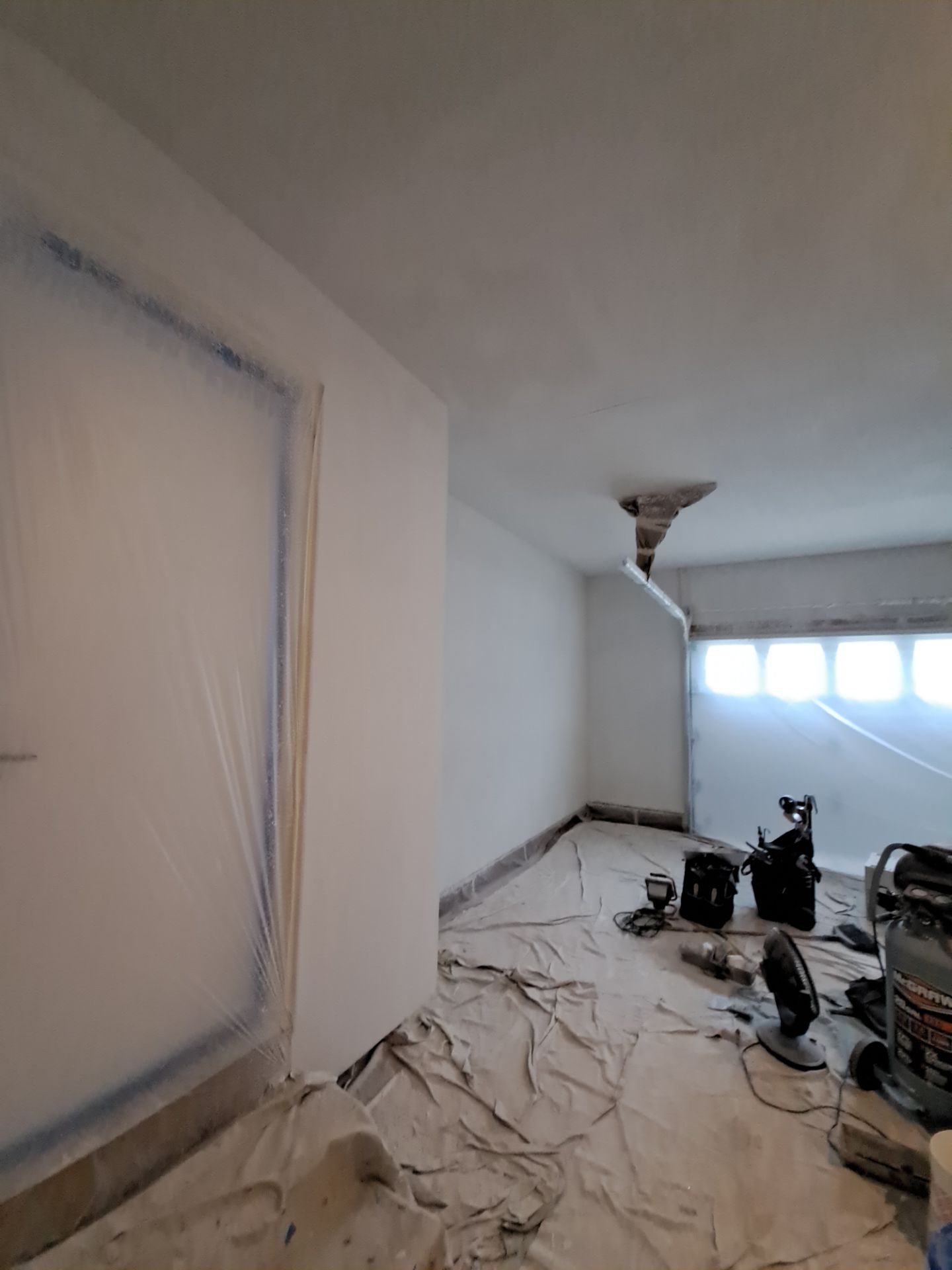 Garage dry wall repair/ re-texture, re-paint by Gordon Painting