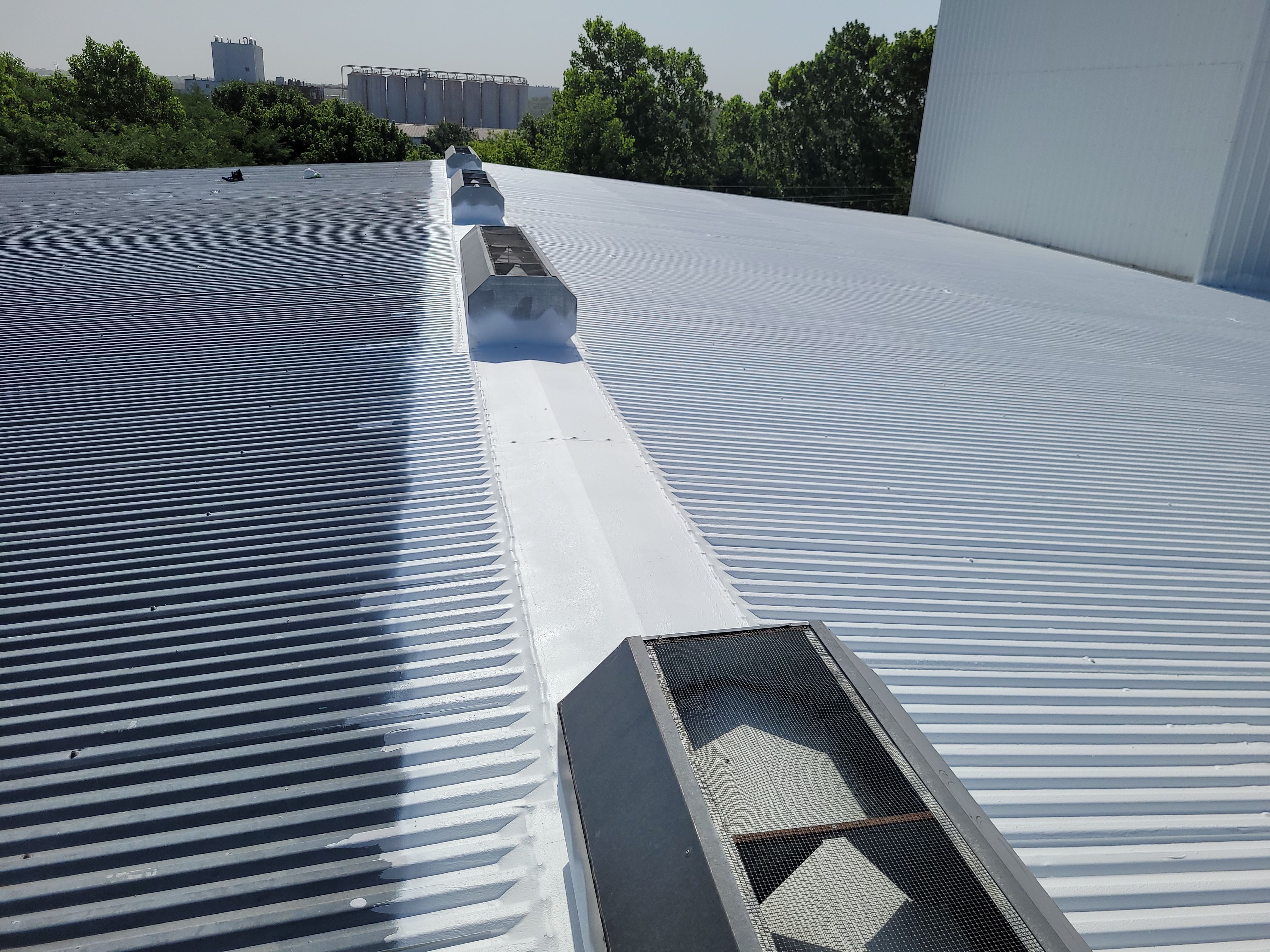 Commercial Metal Restoration System using Aldocoat Coatings by Hostetler Roofing