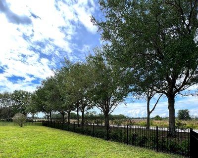 Aluminum Fence Installation using Black 3 Rail Aluminum Fence