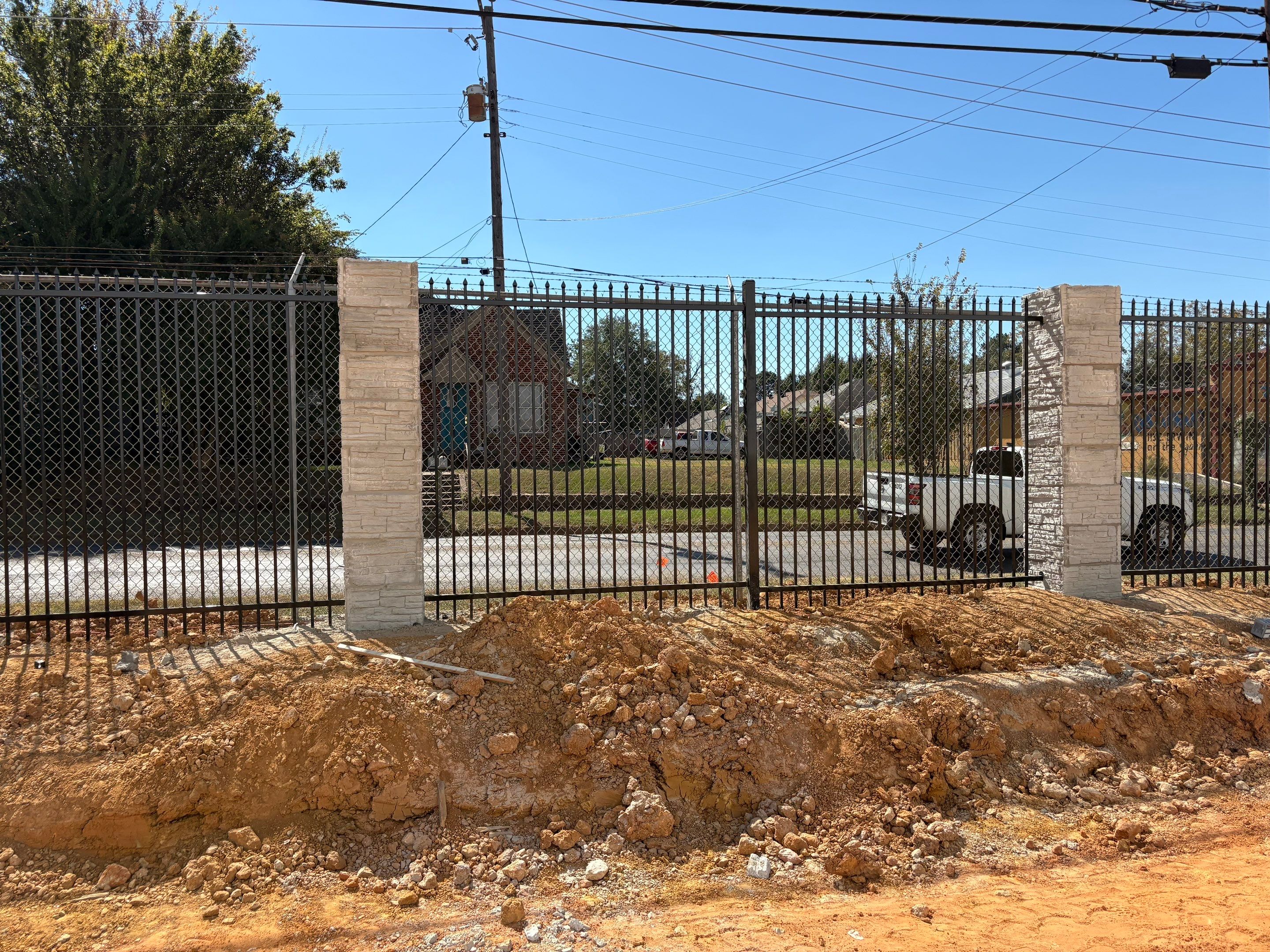 Commercial Fencing - Wrought Iron with Concrete columns by 3:16 Roofing and Construction