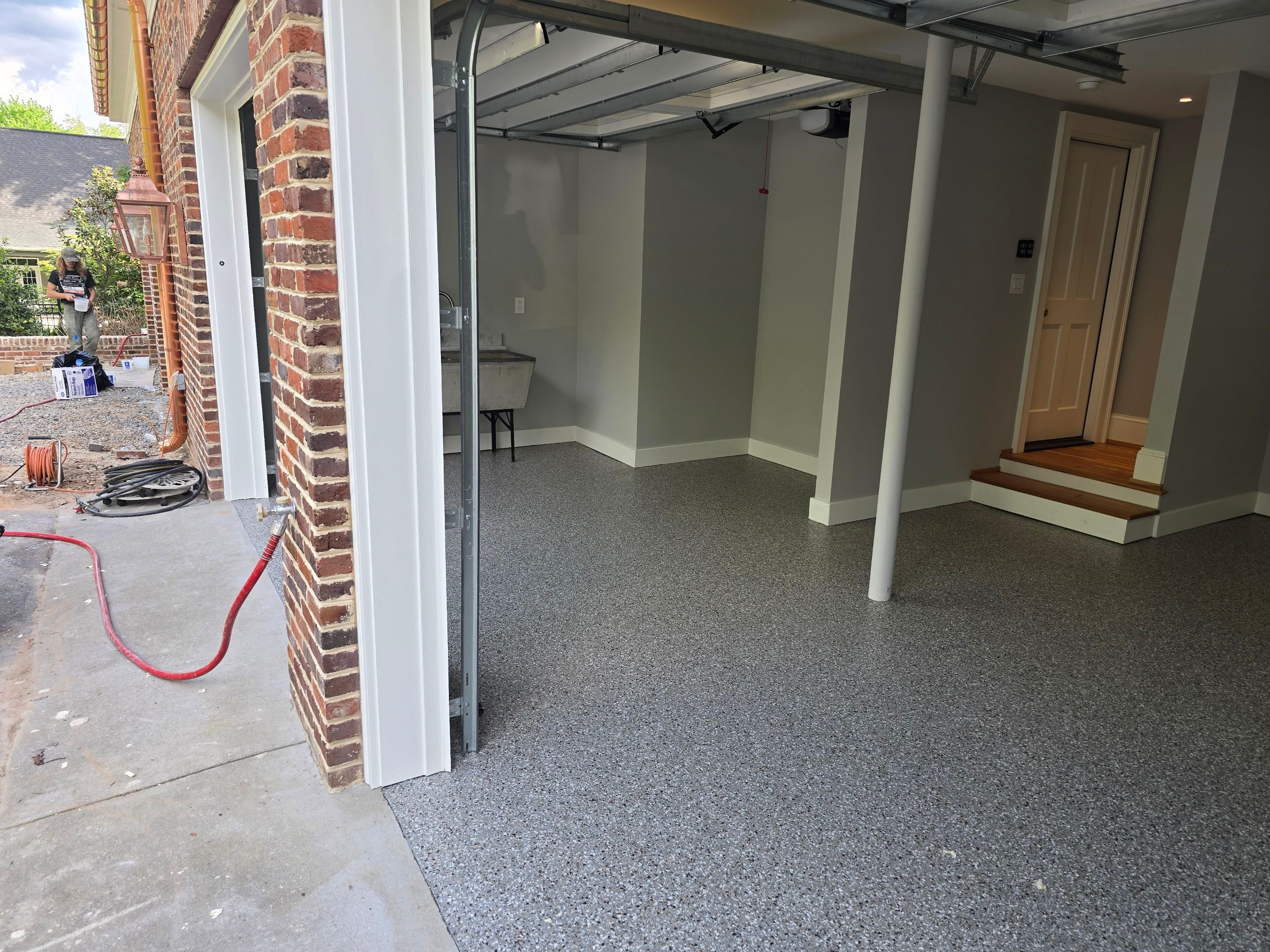 Two Garages Using Creekbed  by Elite Floor Solutions