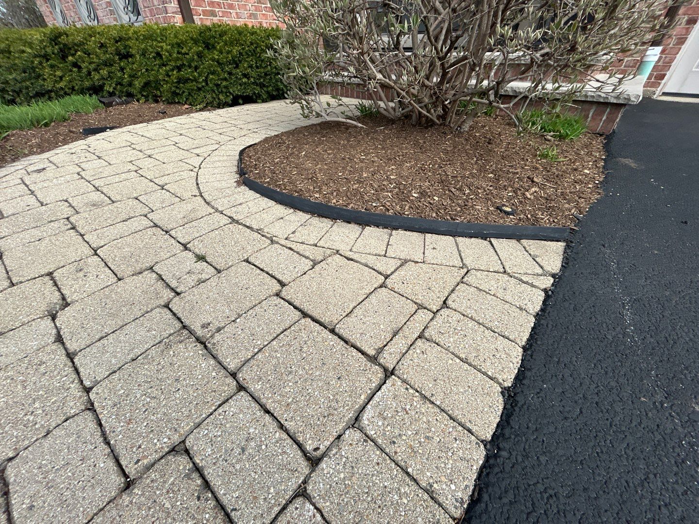 Brick paver repair, cleaning sanding and sealing by Northern Power Washing LLC.