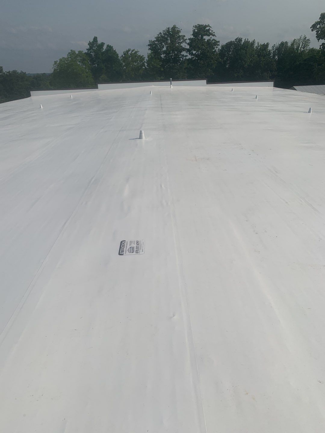 Commercial Roofing Installation using 50 mil PVC by Hostetler Roofing