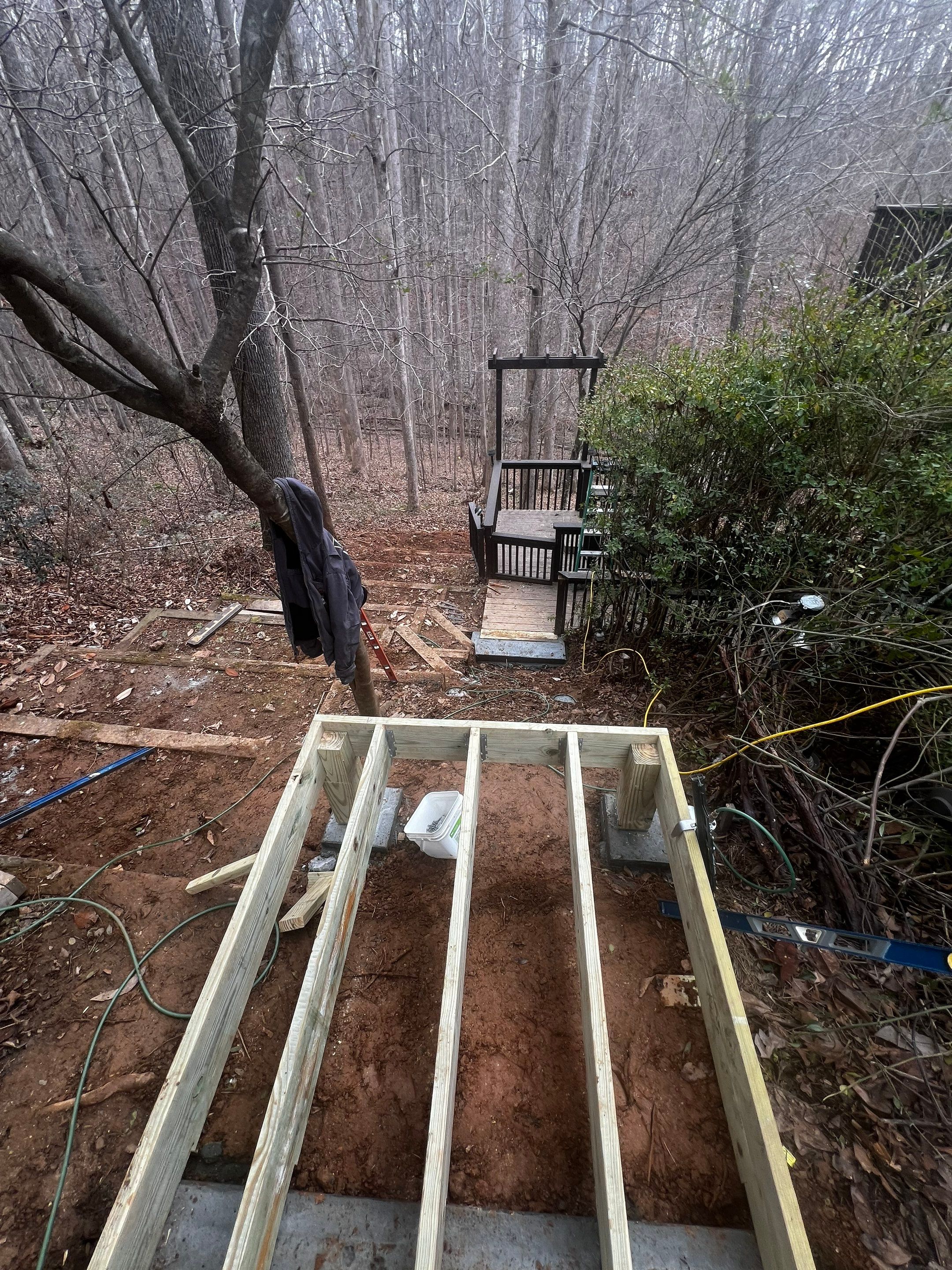Custom Wooden Hillside Stairway Replacement with Pergola Landing in Canton by Swift Home Renovations