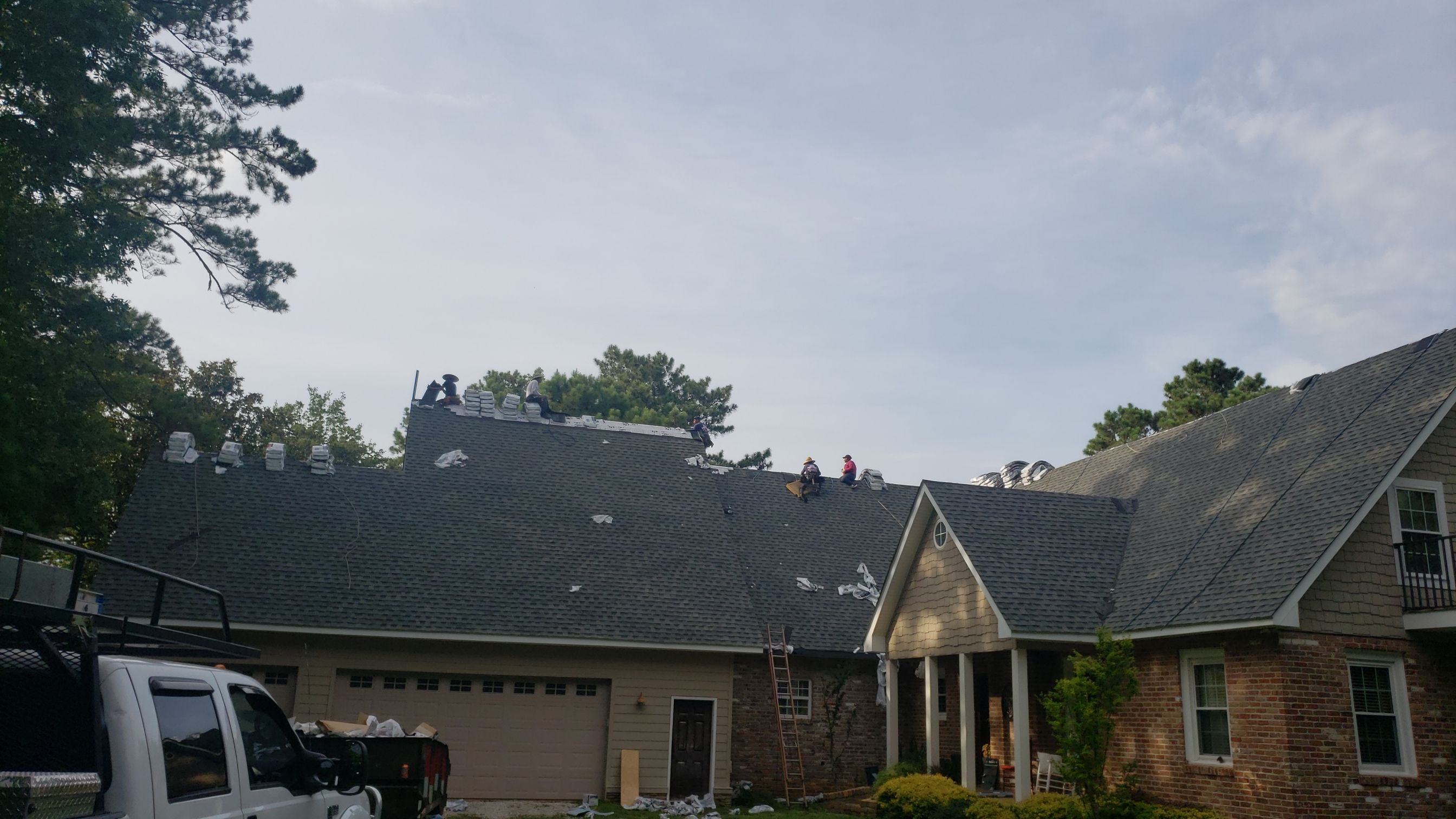Residential Roofing Installation using Roof Replacement by American Roofing & Construction LLC