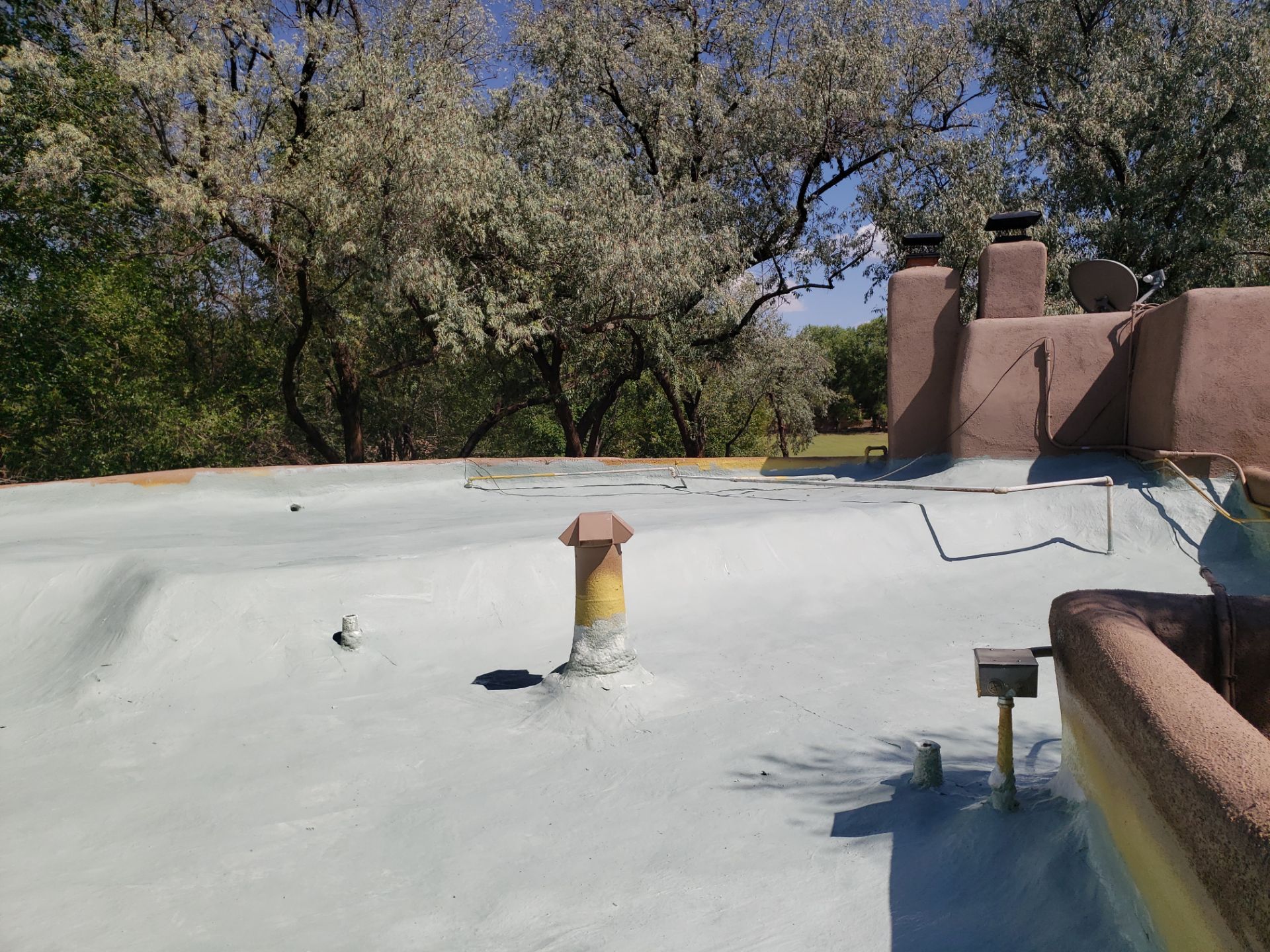 Residential roof application by SPF Services 