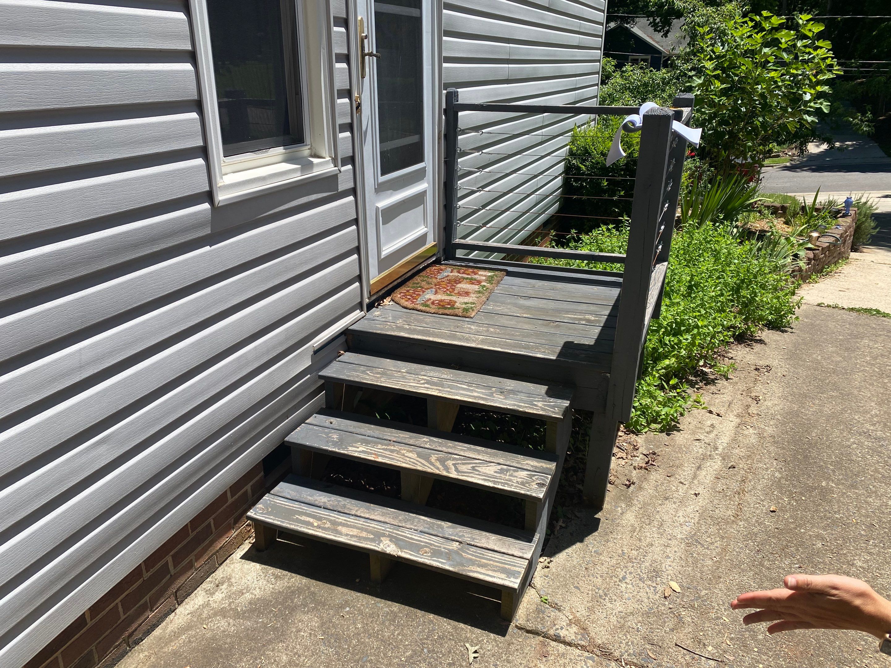 Custom Pressure-Treated Deck and Metal Roof Installation in Durham by The Remodeling Company