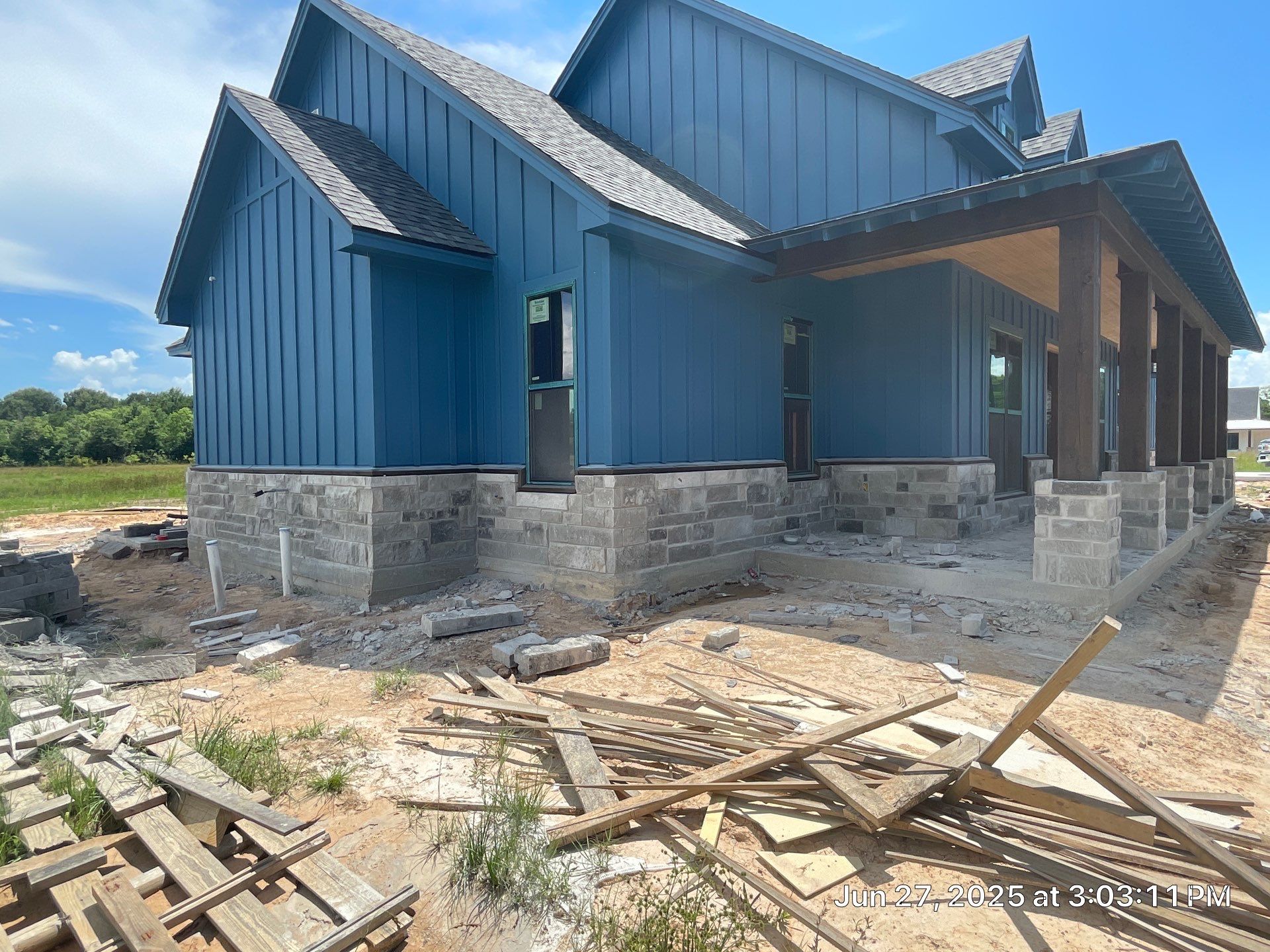 Natural Stone Elegance: Apex Installation Accented by Blue Siding by Apex Conventional Stucco Llc