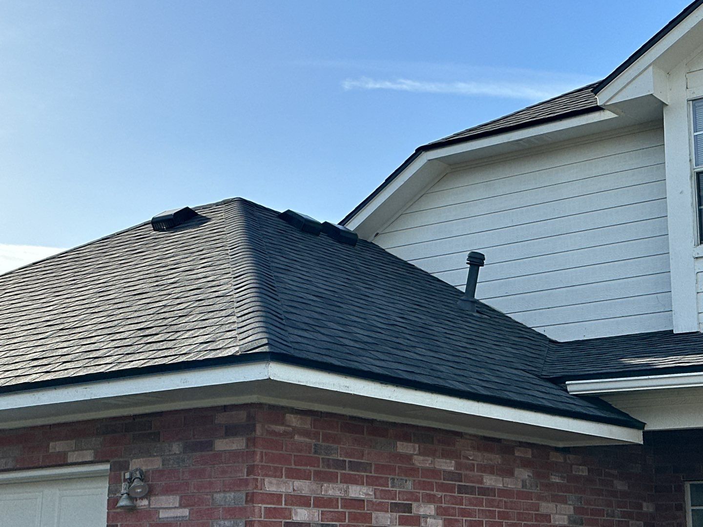 Residential Roofing Installation using Certainteed Landmark Moire Black by Galvan Roofing and Construction