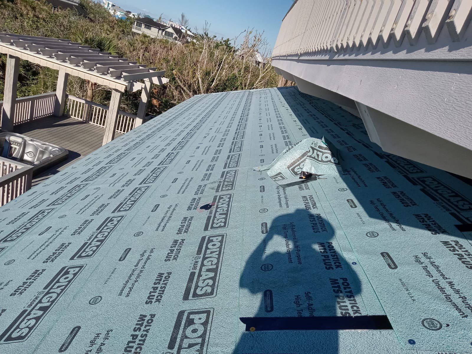 Residential Roofing Installation using Gulf Coast Metals Gulf Seam Panels by Four Peaks Roofing