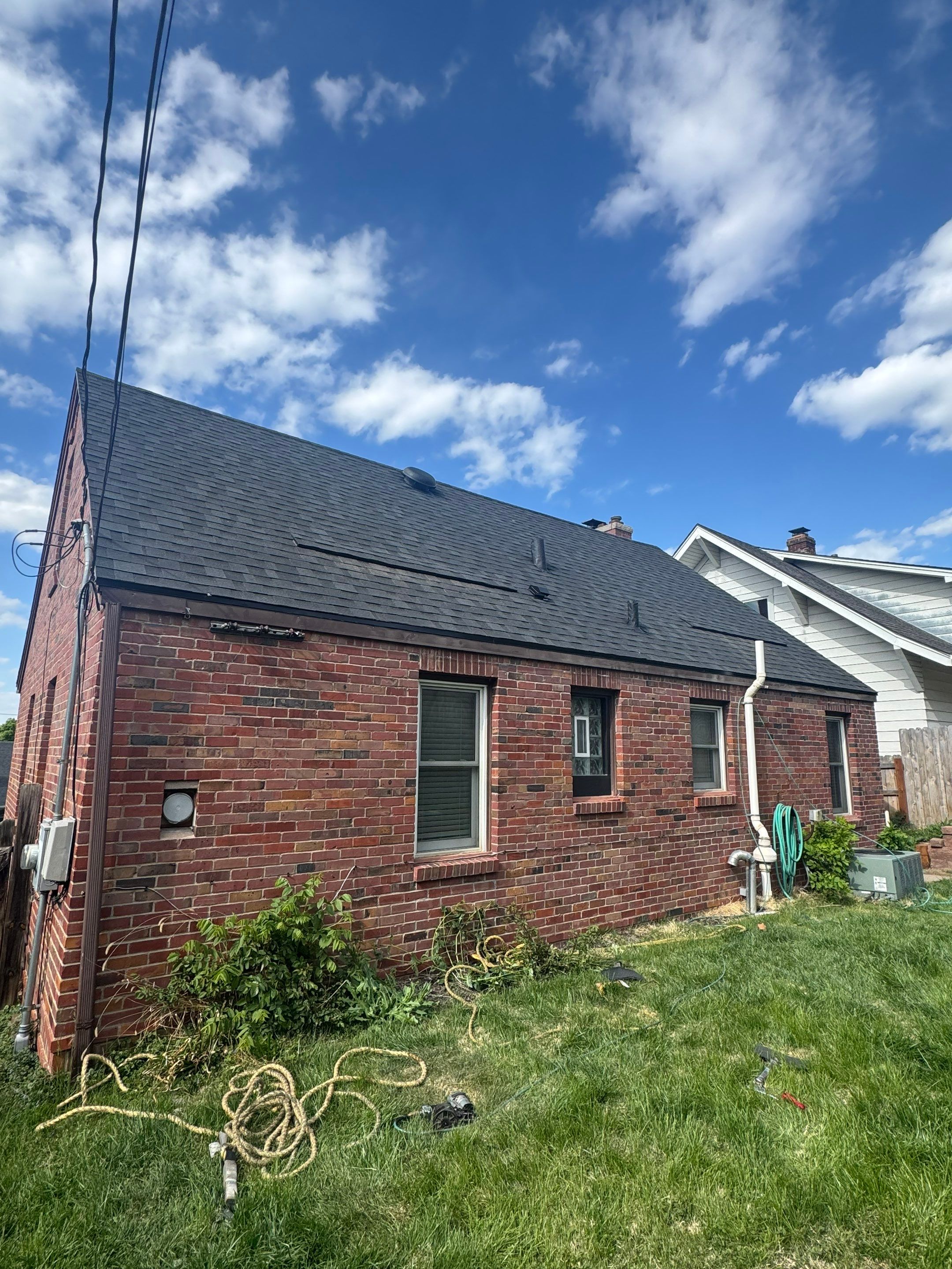 IKO Roof and Seamless Gutters by Lightning Exteriors