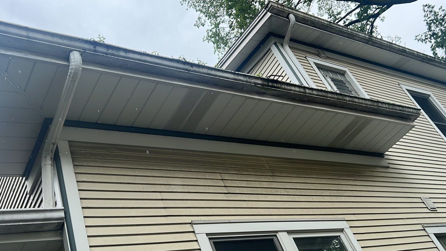 Housewashing  using Algaecide, soft wash soap by Northern Power Washing LLC.