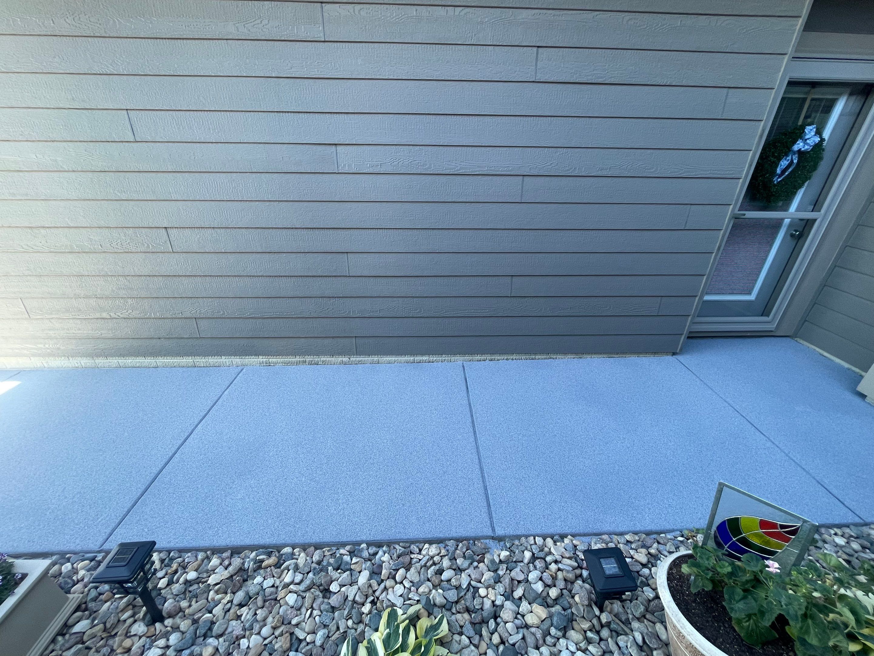 Custom Concrete Coating for Sioux Falls Patio and Front Walkway by Select Painting, Coatings & Garage Cabinets