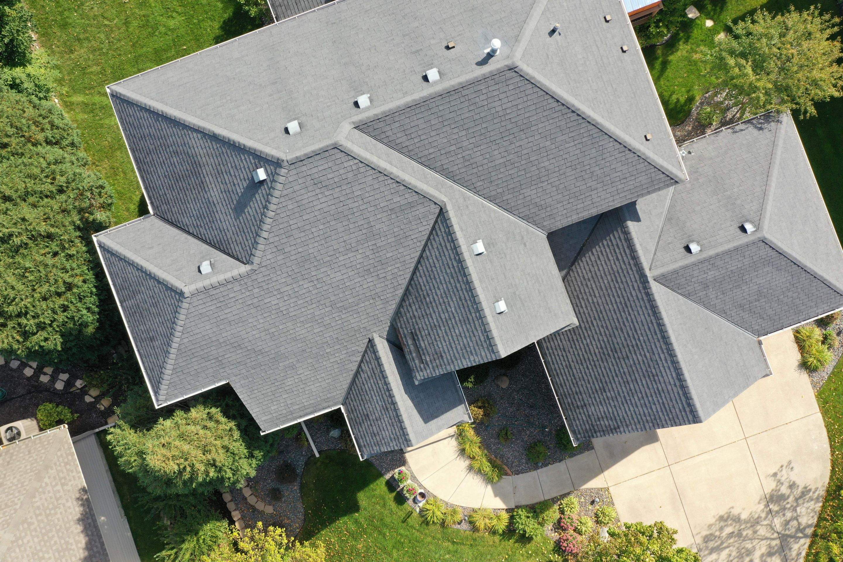 Residential Roofing Installation using Certainteed Landmark Moire Black by MODERN EXTERIOR SYSTEMS