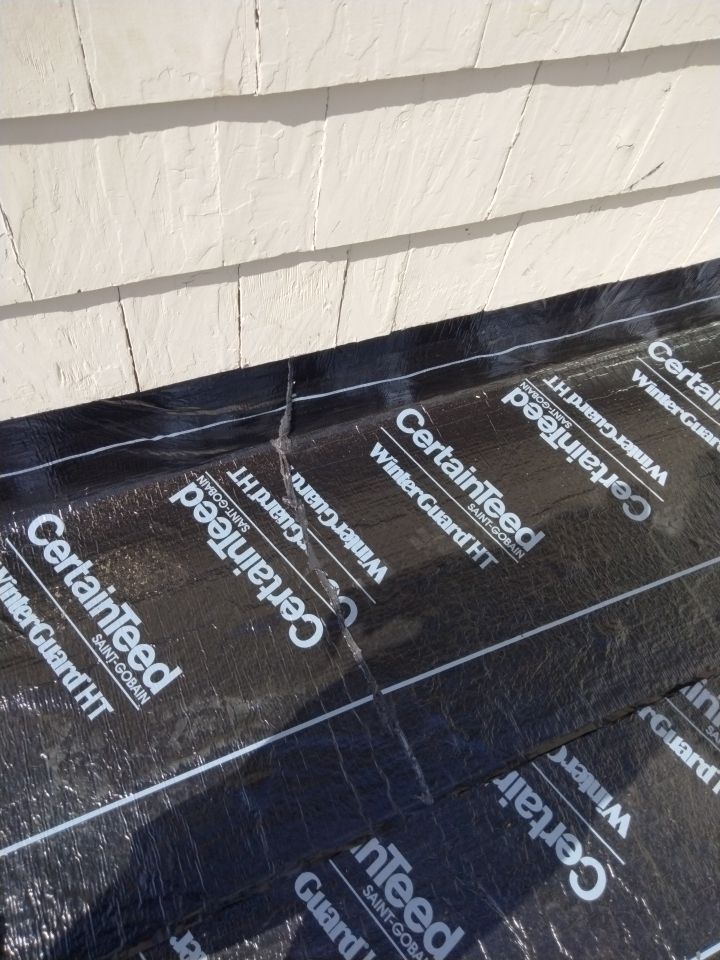 Residential Roofing Installation, Dec-tek walk-out porch roof, siding on garage by Absolute Roofing and Construction
