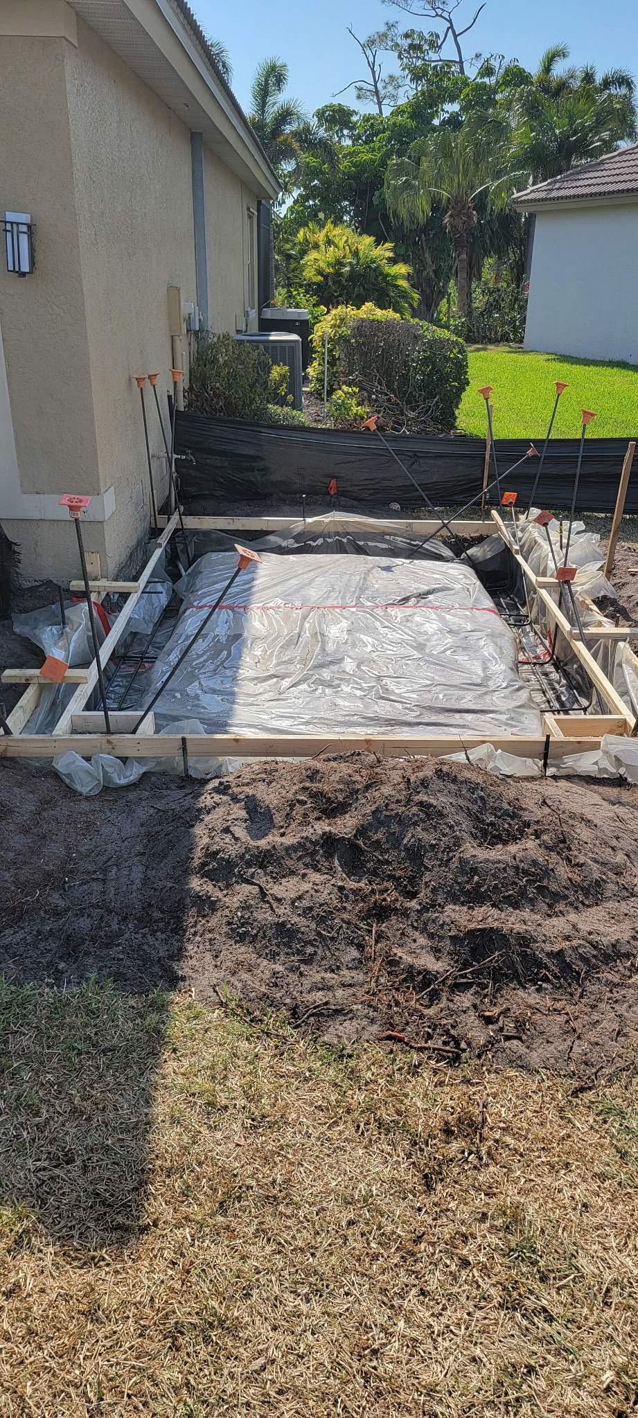 Custom Golf Cart Garage Addition and Paver Driveway in Port Charlotte by Vertical General Contracting 