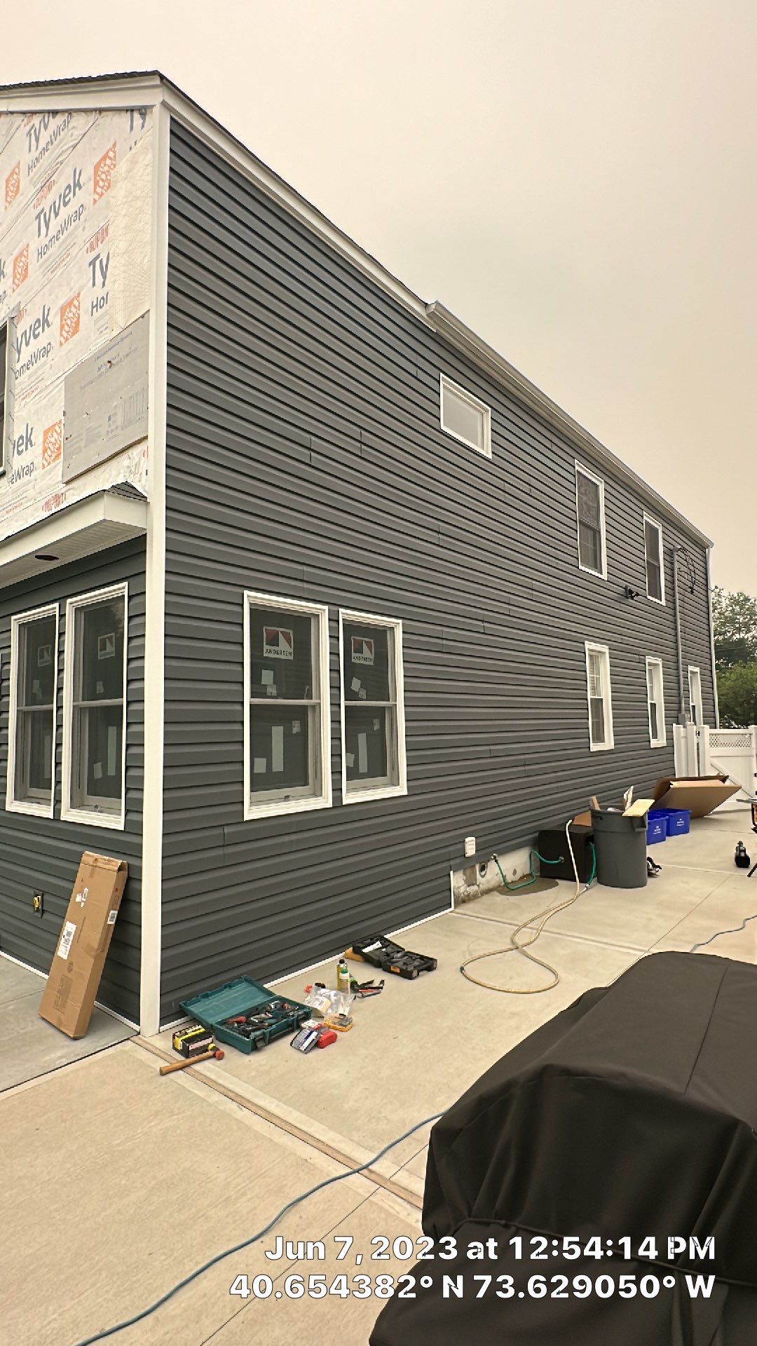 Gutter Installation using 5"white K style seamless gutters and 2x3 white leaders by Above All Gutters 