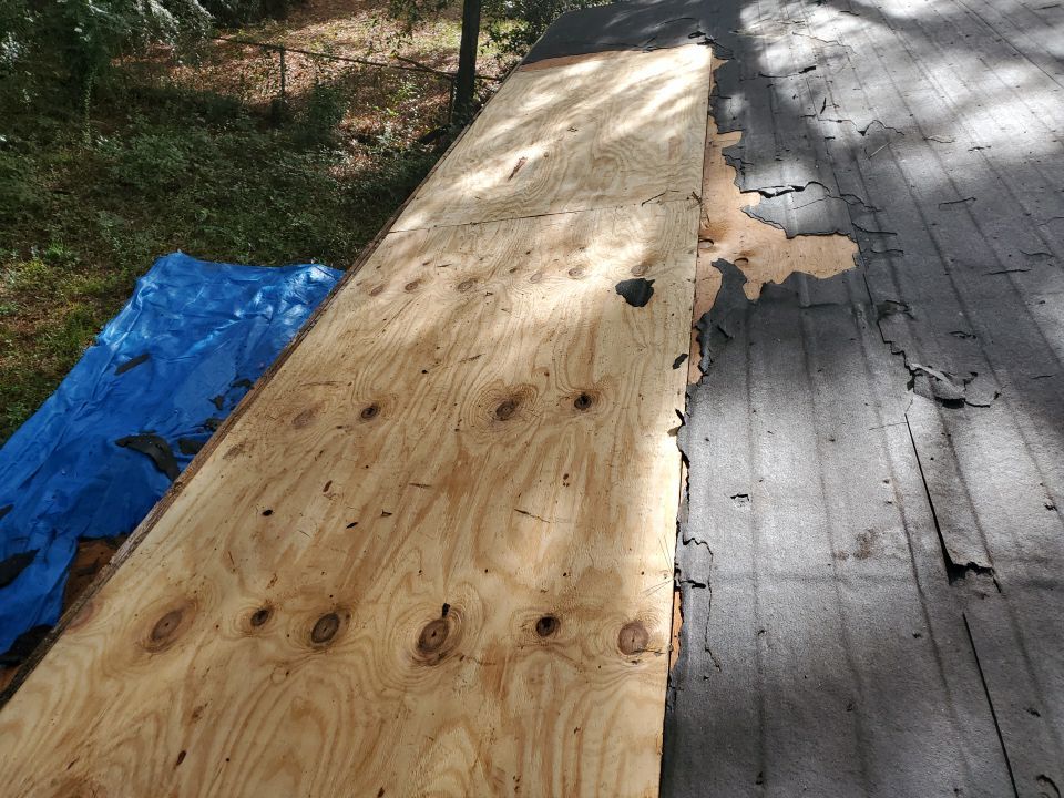Residential Roofing Repair using Roof Replacement by American Roofing & Construction LLC