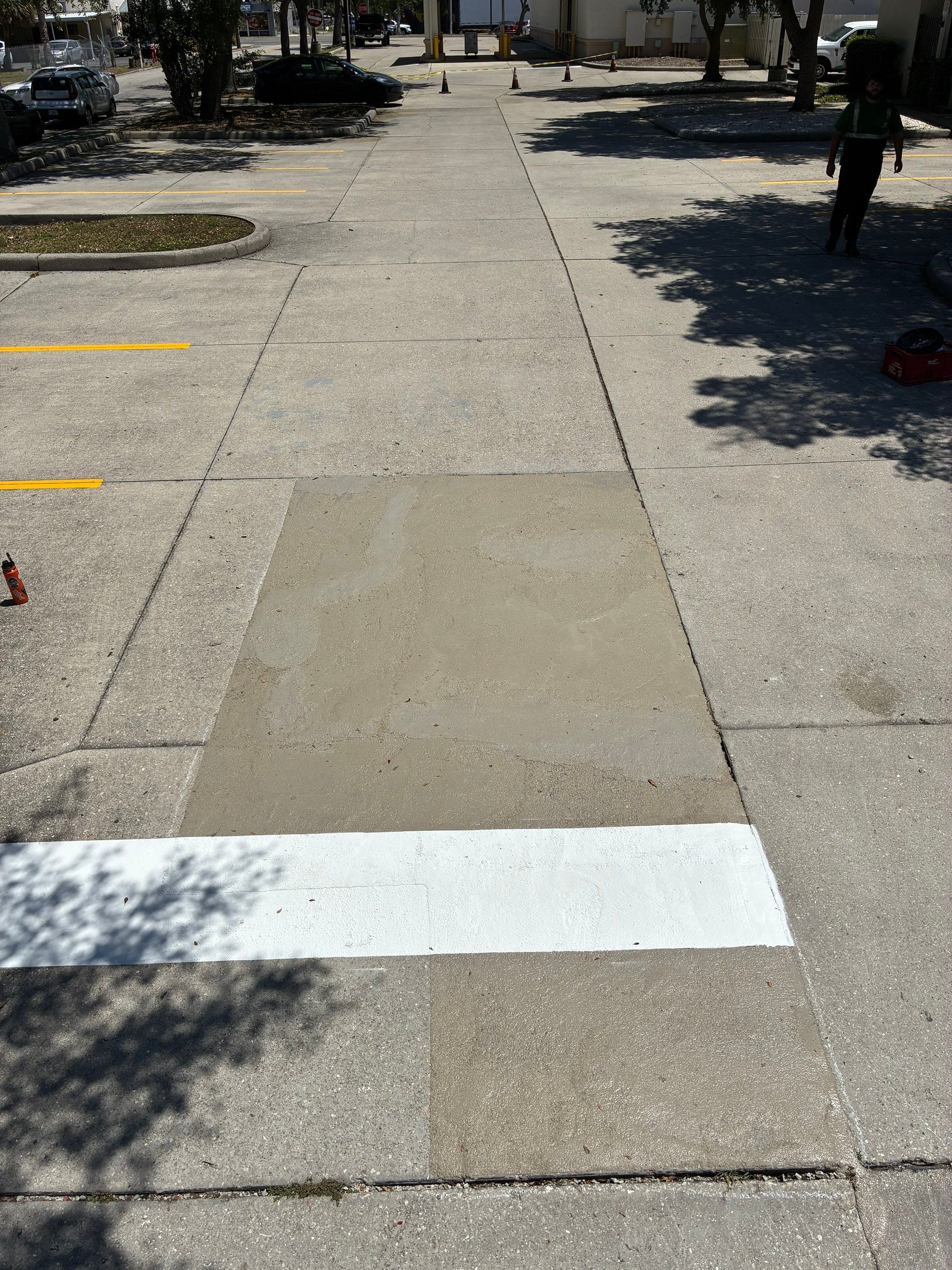Line Striping and Concrete Pothole Repair at the Sarasota Chamber of Commerce by Everline Coatings & Services - Southwest FL