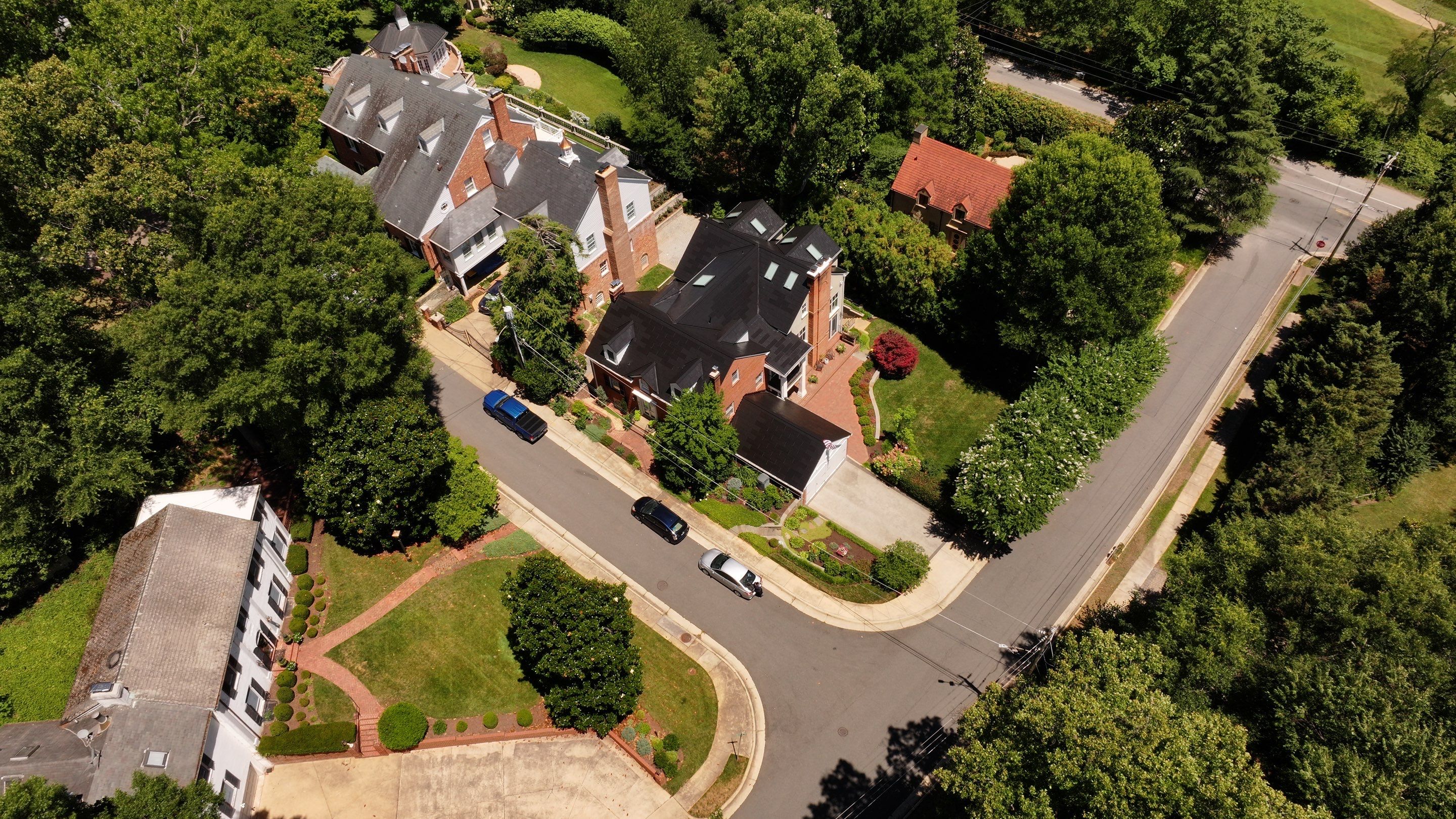 Sleek Tesla Solar Roof + Powerwall Installation | Alexandria, VA by American Home Contractors