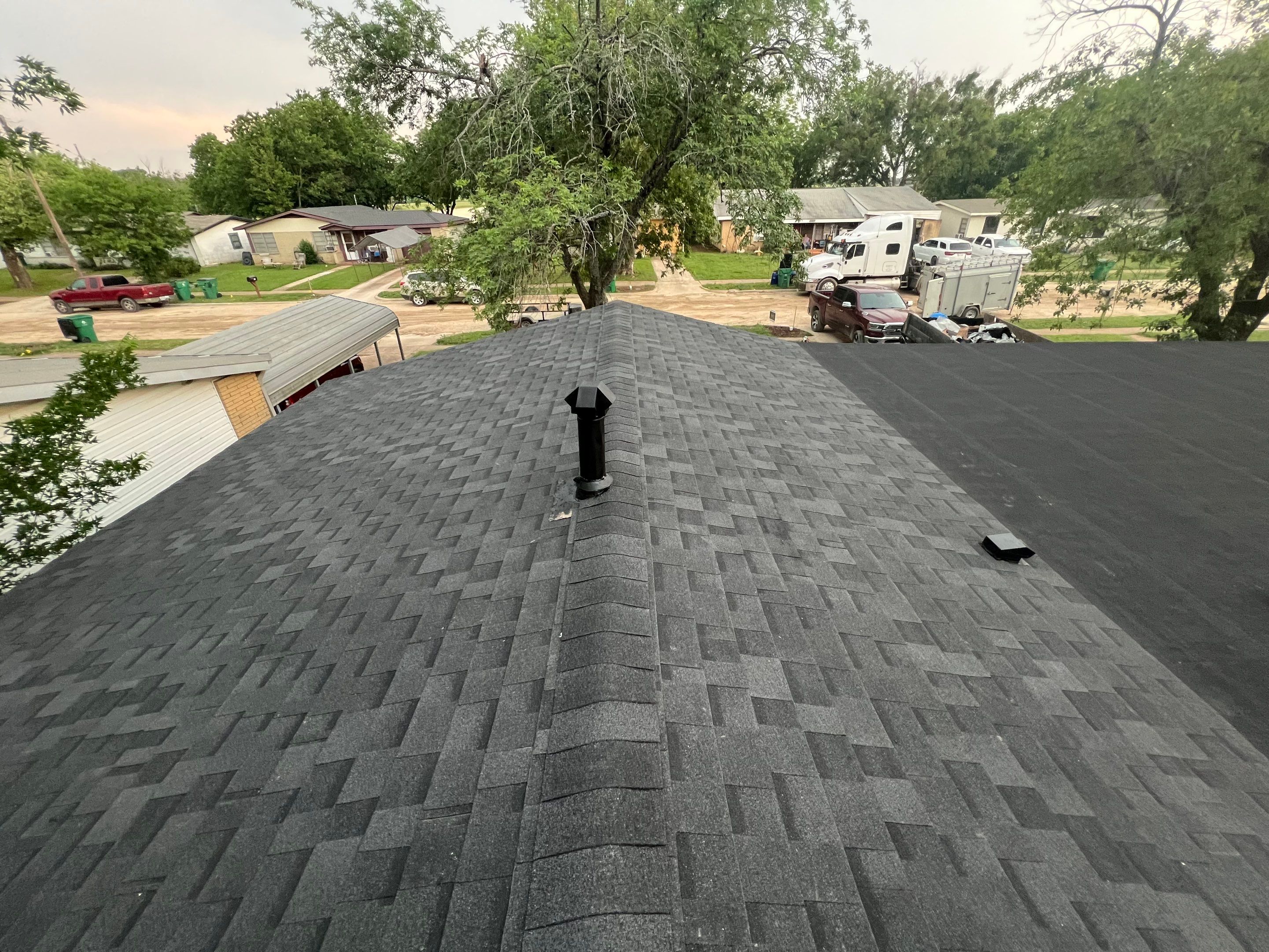 Residential Roofing Installation using IKO Cambridge Dual Black and Mule Hide Rolled Roofing Base and Cap Sheet by WR Roofing Solutions