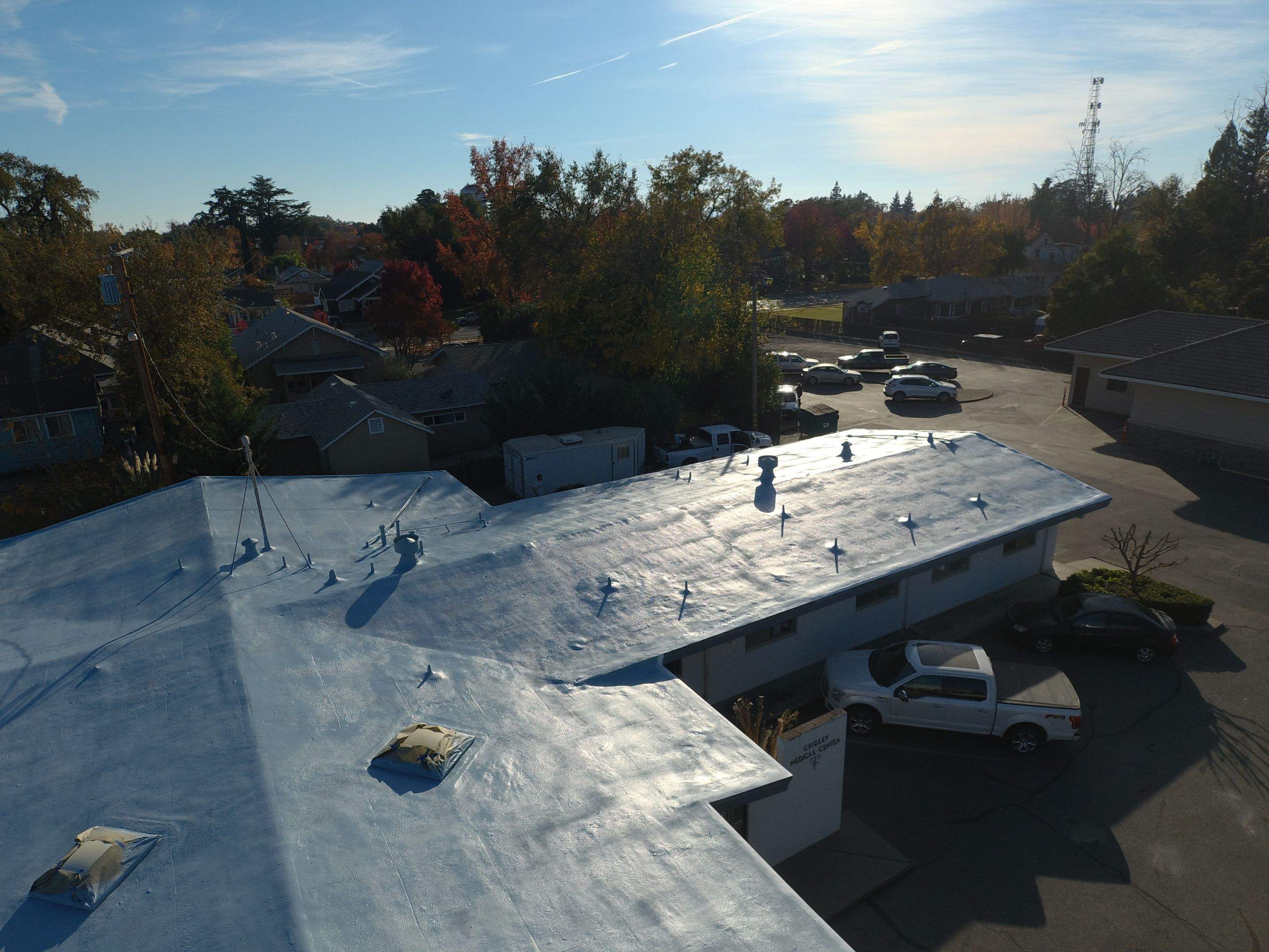 Spray foam and coatings using Conklin Benchmark/PUMA XL coatings and spray foam by Straight Edge Roofing Inc