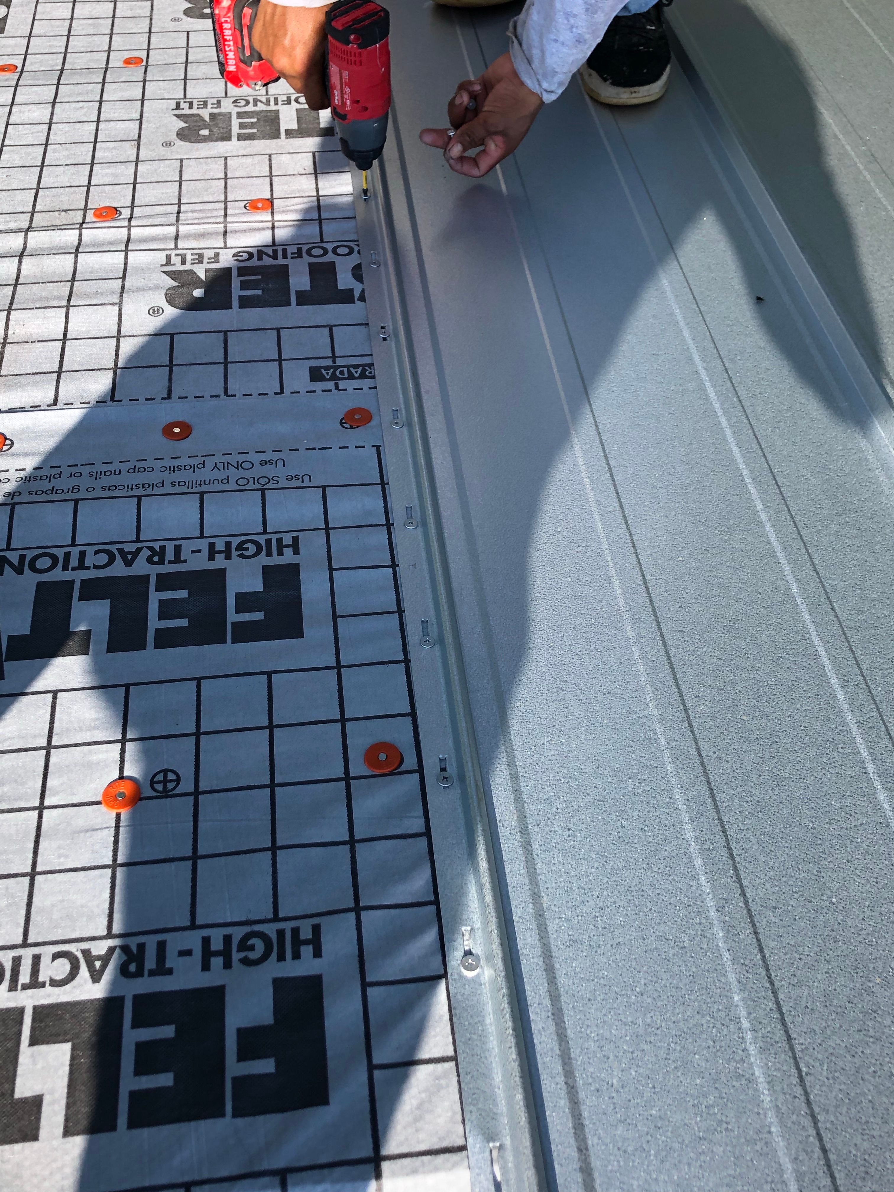 Residential Roofing Installation using Metal roofing by American Roofing & Construction LLC