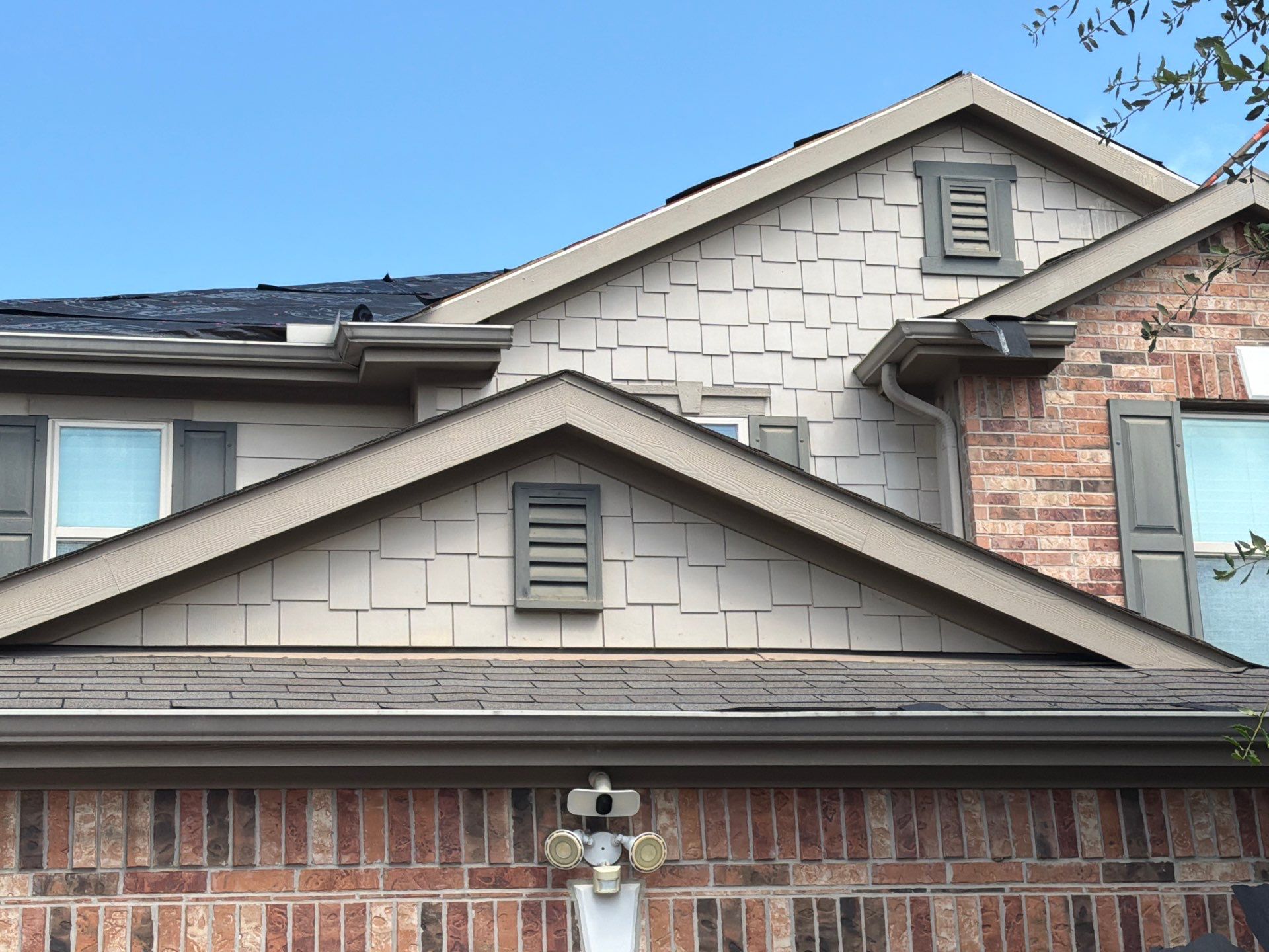 Owens Corning Shingle Roofing Replacement for Houston Two-Story Home by Houston Roofing & Construction