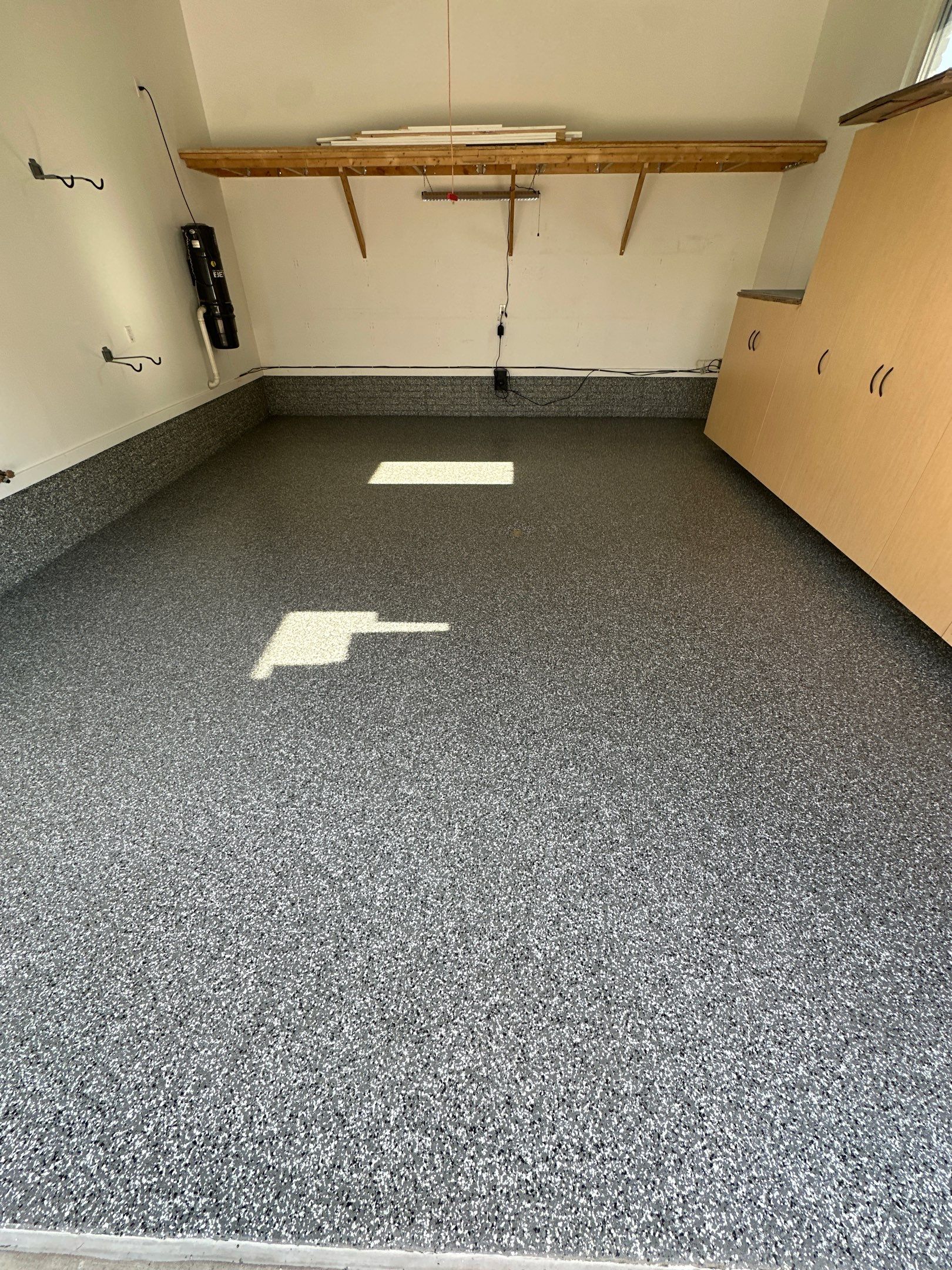 FLEXING 💪 on the Old Epoxy Coating with a Polyaspartic Coating Built to Last 💪  by Revival Concrete Coatings, LLC