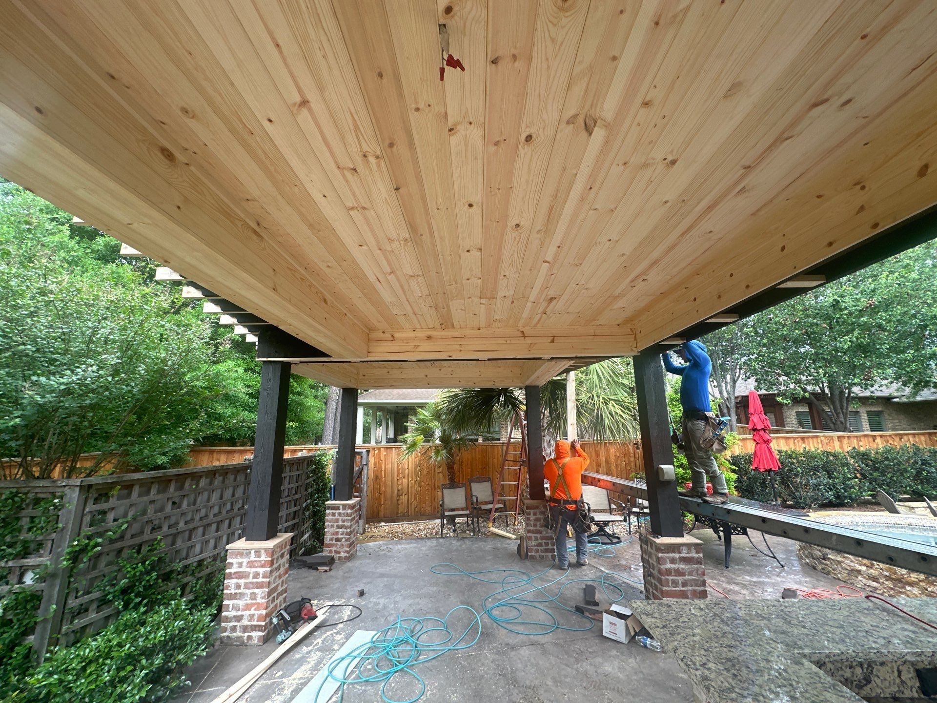 Covered Patio Remodel in The Woodlands by SophAlx LLC