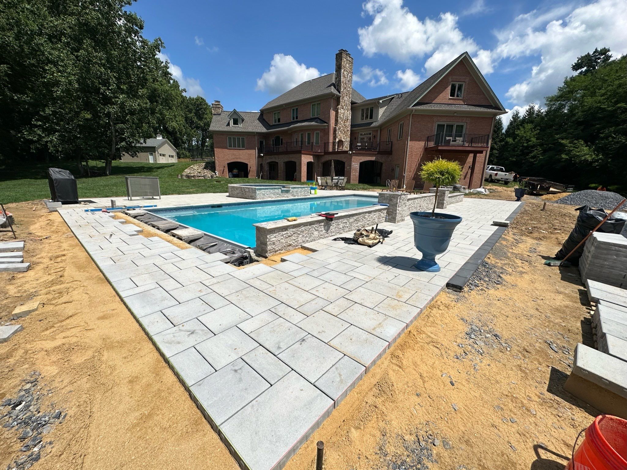 Gunite Pool w/ Spa and Water Features  by Elysium Pools