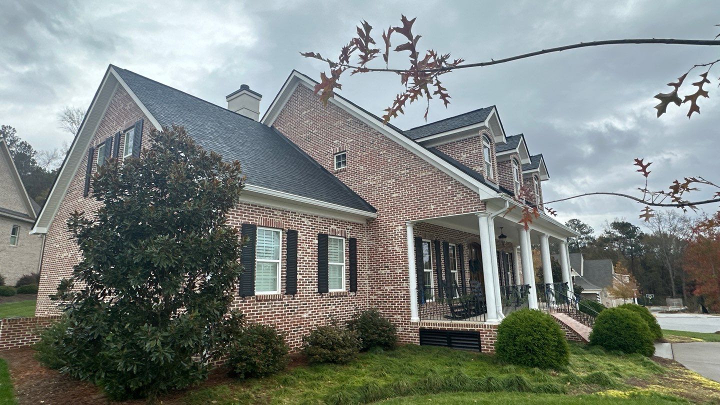 Full Roof Replacement with Oakridge Shingles and Gutter Guards in Rock Hill by Merritt Roofing LLC