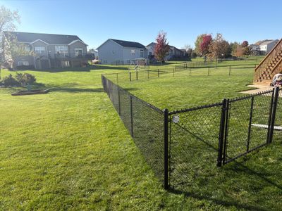 Black Vinyl-Coated Chain Link Fence Installation in Cedar Falls