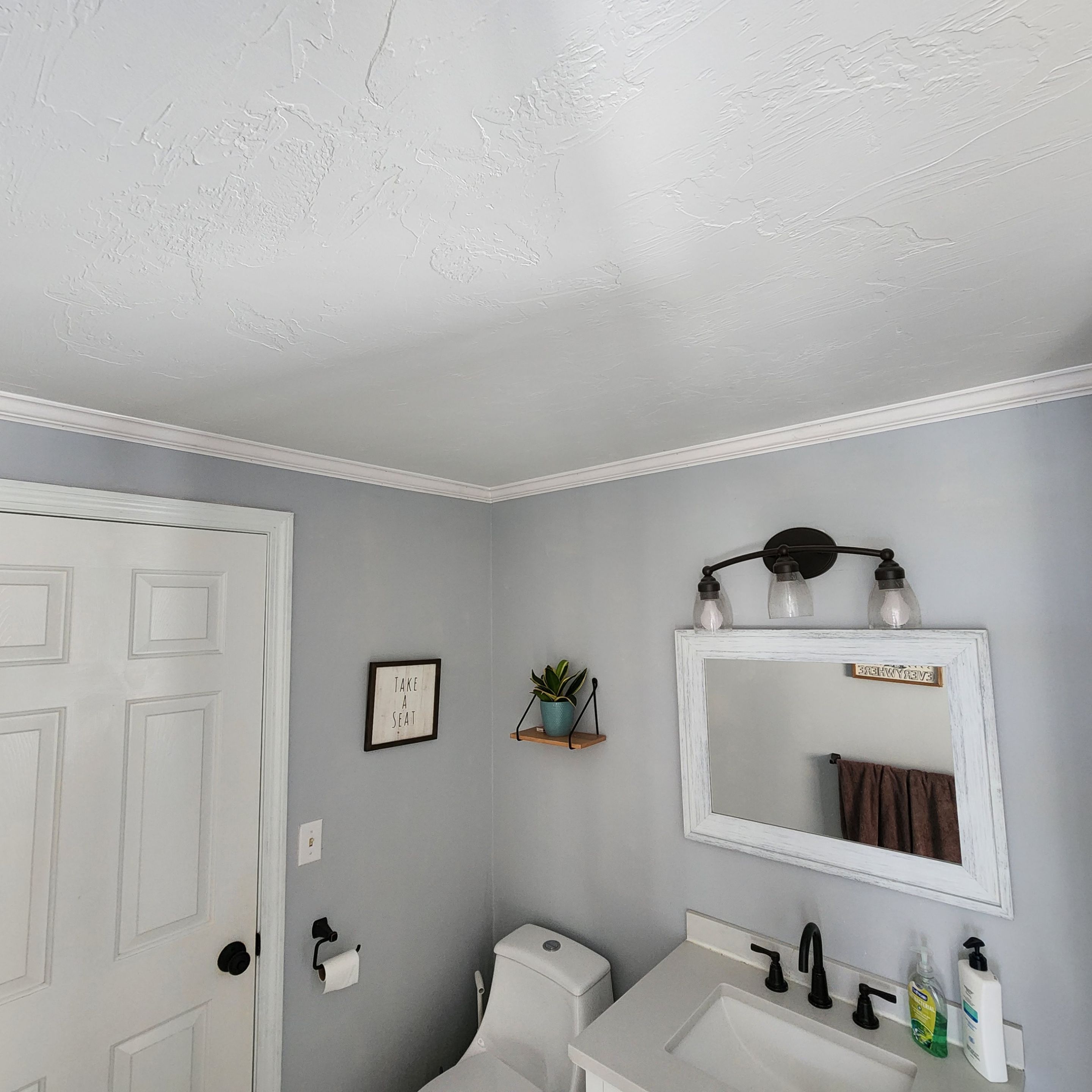 Crown molding installed throughout the first floor in this home. by Freedom Handyman Services