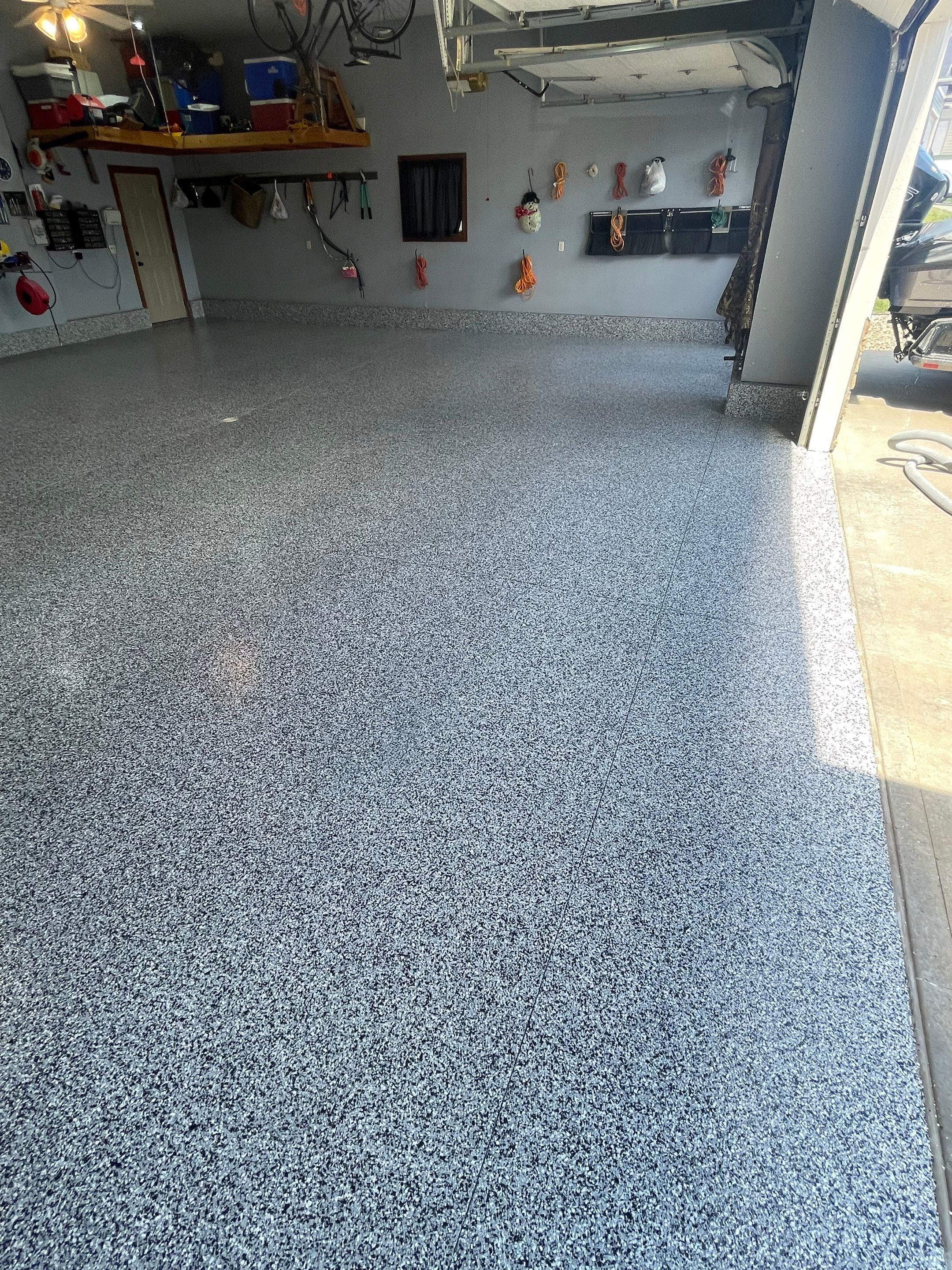 Residential Garage Floor Coating in Sioux Falls by Select Painting, Coatings & Garage Cabinets