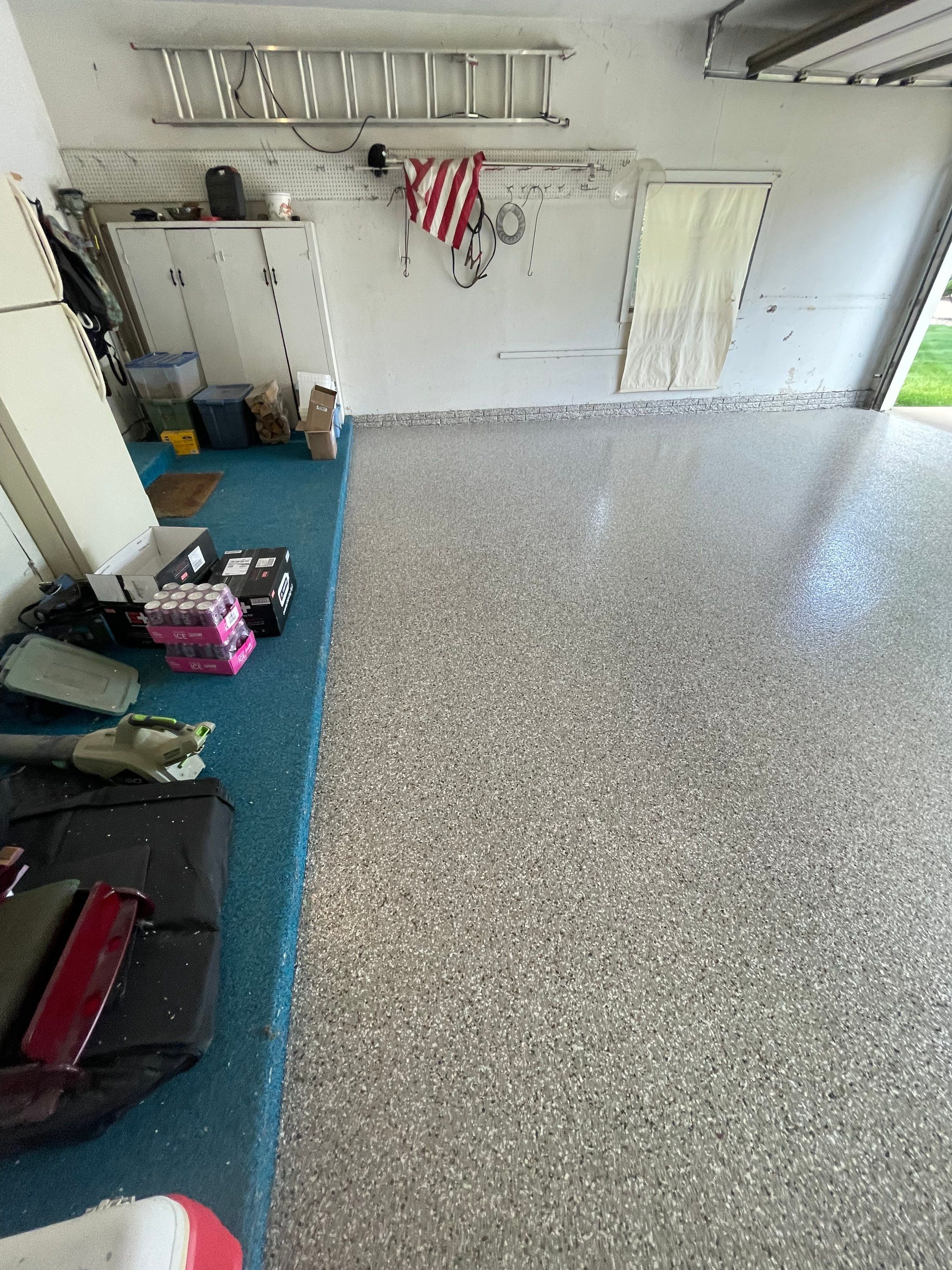 Custom Creekbed Garage Floor Coating in Sioux Falls by Select Painting, Coatings & Garage Cabinets