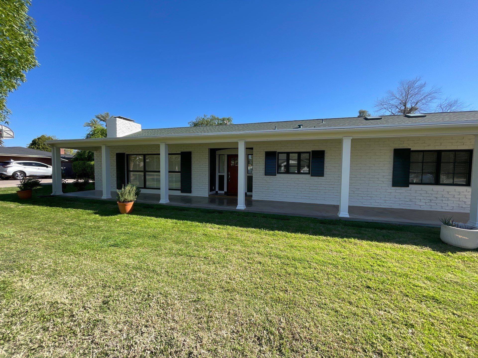 Wagon Wheel - A Stunning Home Exterior Makeover with Dunn Edwards Paints in Phoenix, AZ by Double G Painting Contractors, LLC