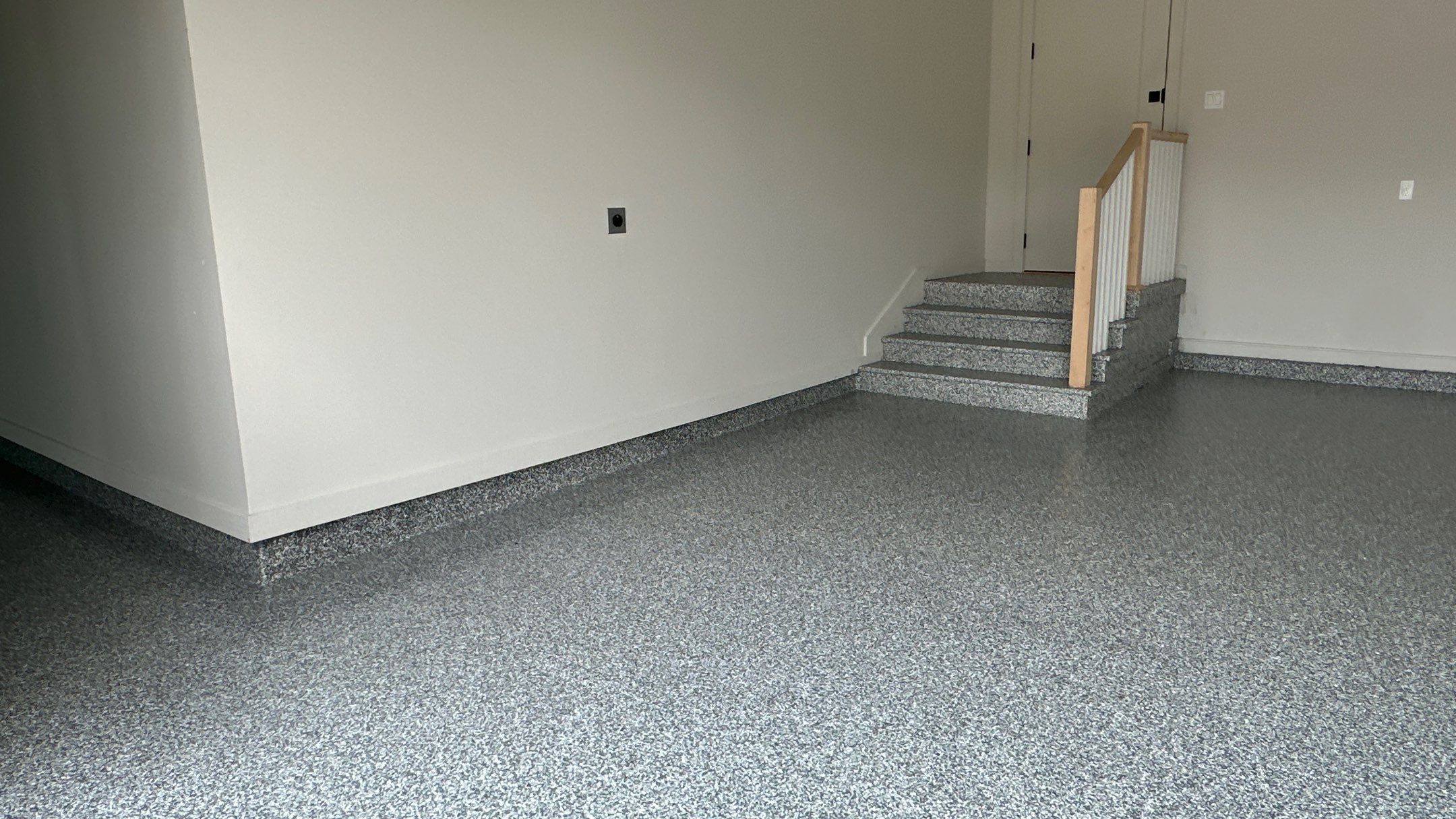 Check out how beautiful a brand new stonehenge flake floor looks by Banner Garage