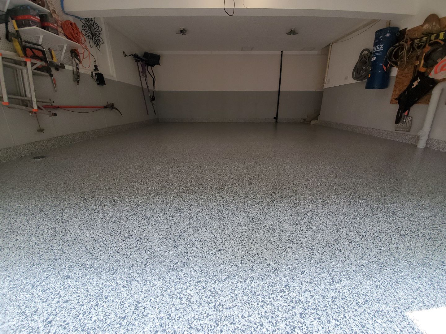 Garage in Chicopee, MA 01013 by Symphony Concrete Coatings