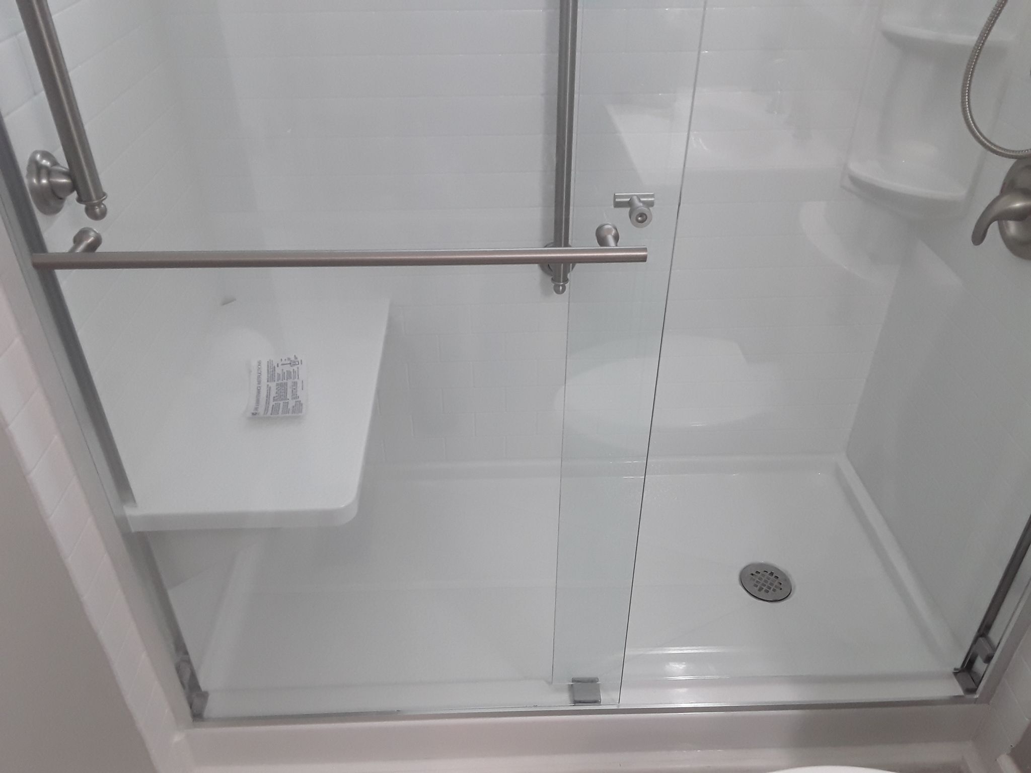 Tub to Shower Conversion using BCI Acrylic Shower System by Secure Construction Company Inc