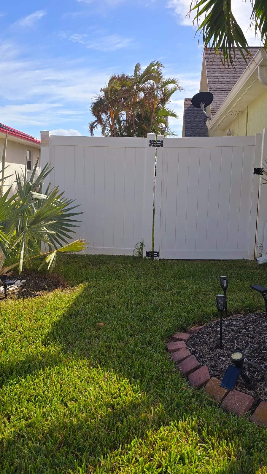 White Vinyl Privacy Fence Installation in Port Charlotte by True Fence LLC