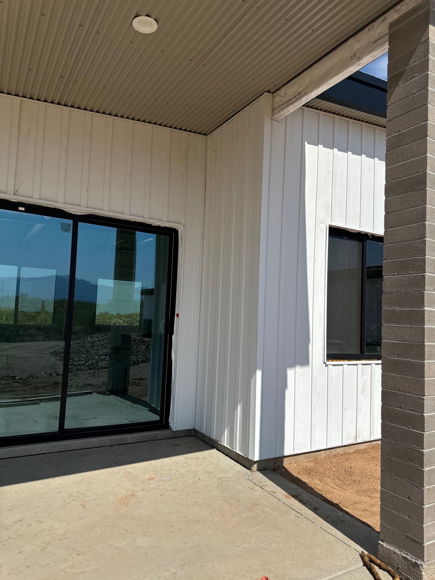 Polar White Metal Siding by Reimagine Roofing